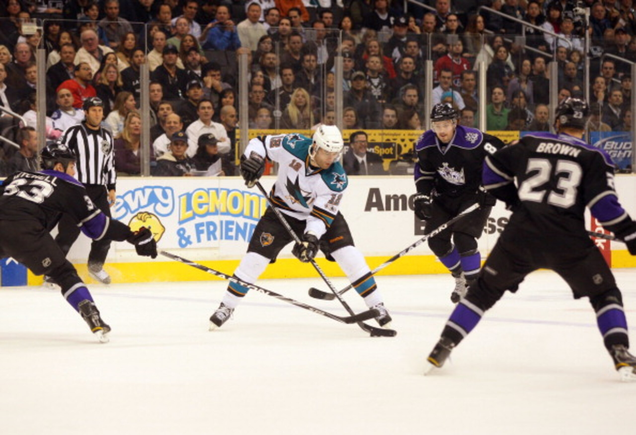 LOS ANGELES, CA - JANUARY 26:  Patrick Marleau #12 of the San Jose Sharks makes a drop pass between his skates on the counterattack against the Los Angeles Kings during their NHL game at Staples Center on January 26, 2011 in Los Angeles, California. The K