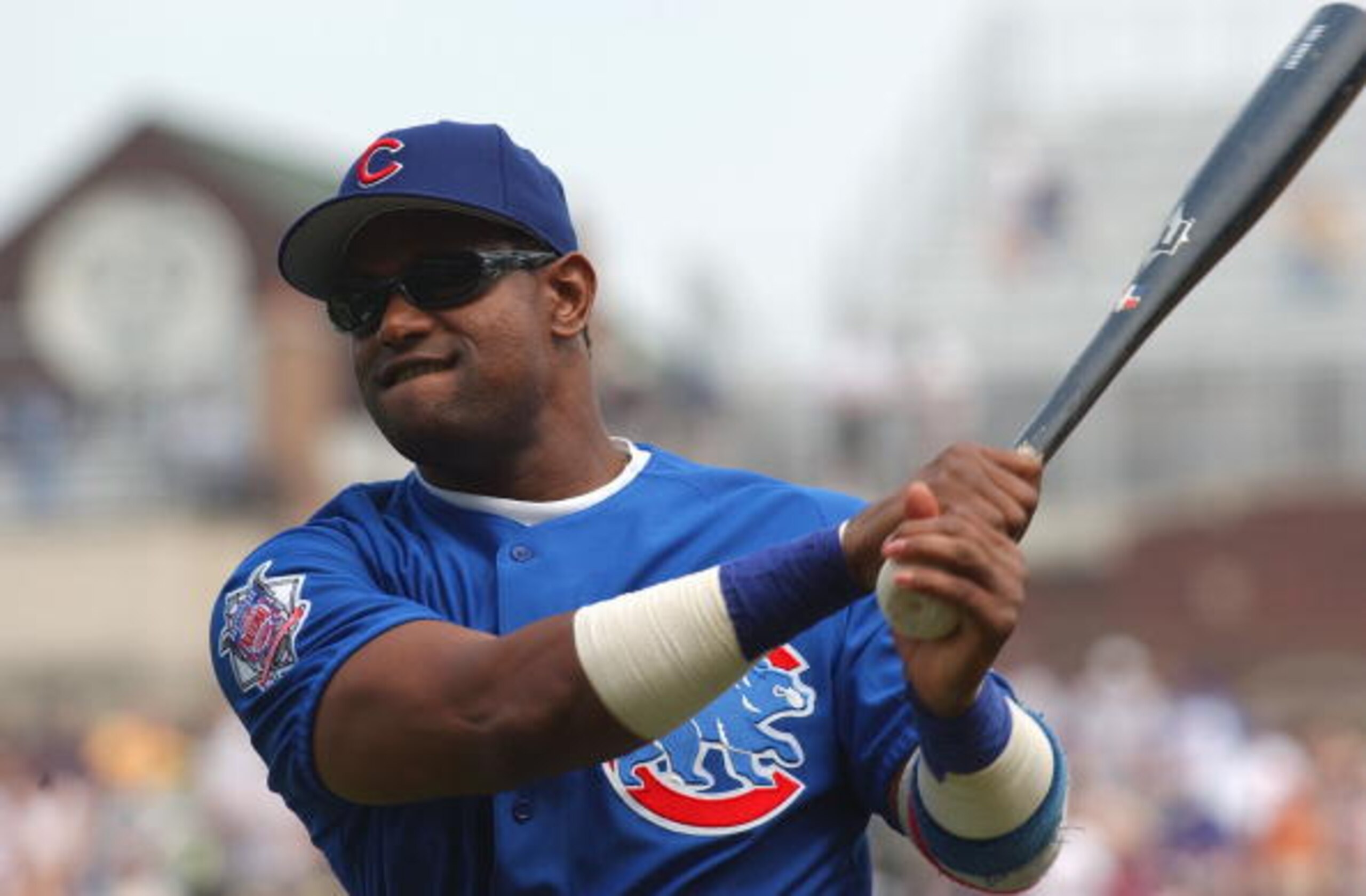 CHICAGO - JUNE 18: Sammy Sosa #21of the Chicago Cubs swings during practice before the interleague game against the Oakland Athletics on June 18, 2004 at Wrigley Field in Chicago, Illinois. The A's defeated the Cubs 2-1. (Photo by Jonathan Daniel/Getty CHICAGO - JUNE 18: Sammy Sosa #21of the Chicago Cubs swings during practice before the interleague game against the Oakland Athletics on June 18, 2004 at Wrigley Field in Chicago, Illinois. The A's defeated the Cubs 2-1. (Photo by Jonathan Daniel/Getty