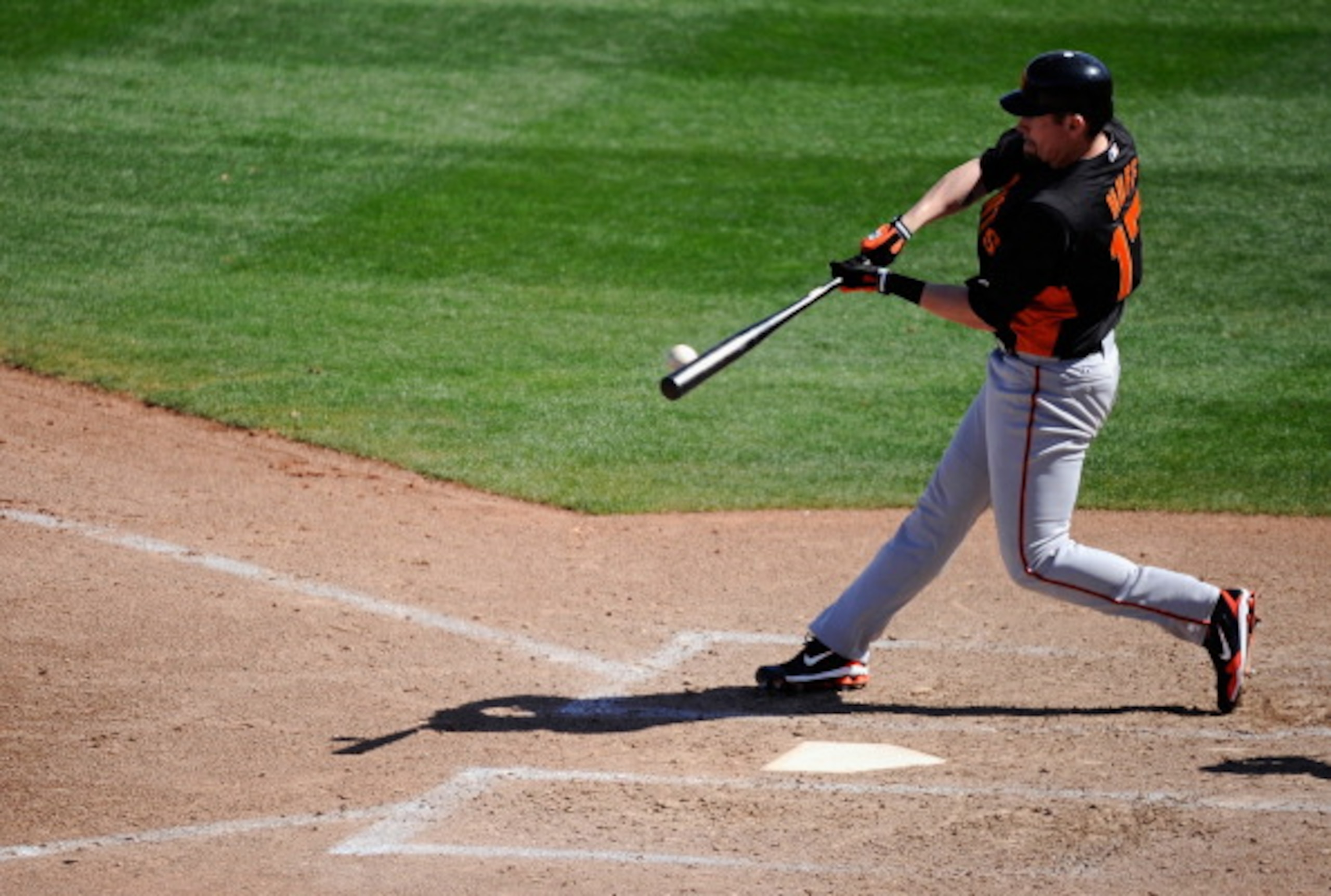 PEORIA, AZ - MARCH 08: Aubrey Huff #17 of the San Francisco Giants hits a deep fly out against Seattle Marinerr during the spring training baseball game against at Peoria Stadium on March 8, 2011 in Peoria, Arizona. (Photo by Kevork Djansezian/Getty Imag PEORIA, AZ - MARCH 08: Aubrey Huff #17 of the San Francisco Giants hits a deep fly out against Seattle Marinerr during the spring training baseball game against at Peoria Stadium on March 8, 2011 in Peoria, Arizona. (Photo by Kevork Djansezian/Getty Imag