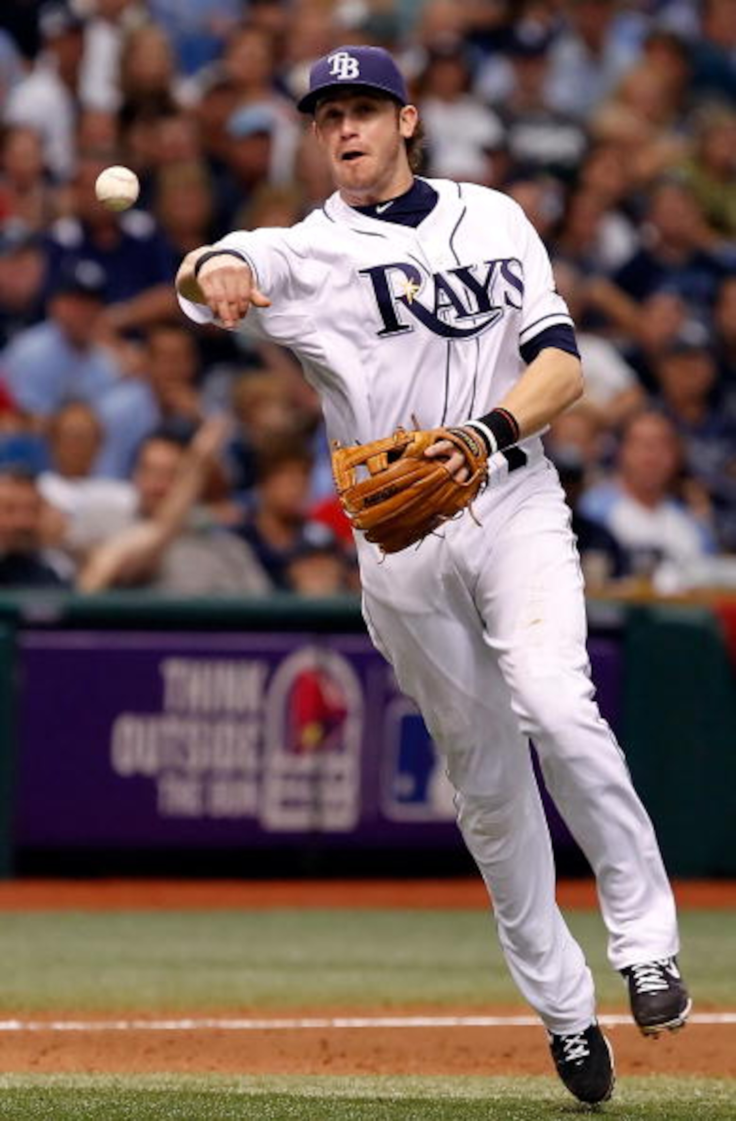 ST. PETERSBURG, FL - OCTOBER 06: Infielder Evan Longoria #3 of the Tampa Bay Rays throws over to first for an out against the Texas Rangers during Game 1 of the ALDS at Tropicana Field on October 6, 2010 in St. Petersburg, Florida. (Photo by J. Meric/Ge ST. PETERSBURG, FL - OCTOBER 06: Infielder Evan Longoria #3 of the Tampa Bay Rays throws over to first for an out against the Texas Rangers during Game 1 of the ALDS at Tropicana Field on October 6, 2010 in St. Petersburg, Florida. (Photo by J. Meric/Ge