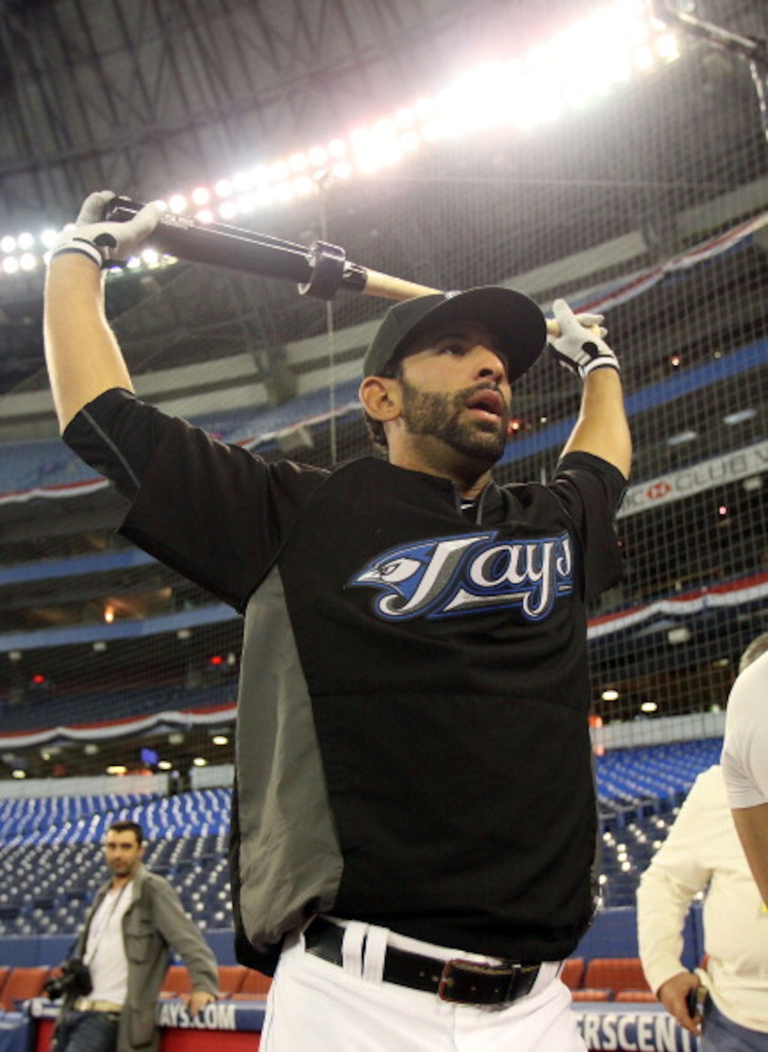 TORONTO,CANADA - APRIL 1: Jose Bautista #19 of the Toronto Blue Jays stretches prior to the home opener for the Toronto Blue Jays as they face the Minnesota Twins during their MLB game at the Rogers Centre April 1, 2011 in Toronto, Ontario, Canada.(Photo TORONTO,CANADA - APRIL 1: Jose Bautista #19 of the Toronto Blue Jays stretches prior to the home opener for the Toronto Blue Jays as they face the Minnesota Twins during their MLB game at the Rogers Centre April 1, 2011 in Toronto, Ontario, Canada.(Photo
