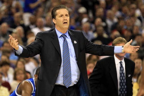 HOUSTON, TX - APRIL 02: Head coach John Calipari of the Kentucky Wildcats gestures from the sidelines against the Connecticut Huskies during the National Semifinal game of the 2011 NCAA Division I Men's Basketball Championship at Reliant Stadium on April