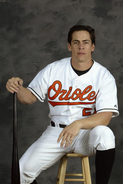 FORT LAUDERDALE, FL - MARCH 2:  Marty Cordova #21 of the Baltimore Orioles poses for a portrait during the Baltimore Orioles Spring Training Camp Photo Day on March 2, 2004 at Fort Lauderdale Stadium in Fort Lauderdale, Florida. (Photo by Robert Laberge/G