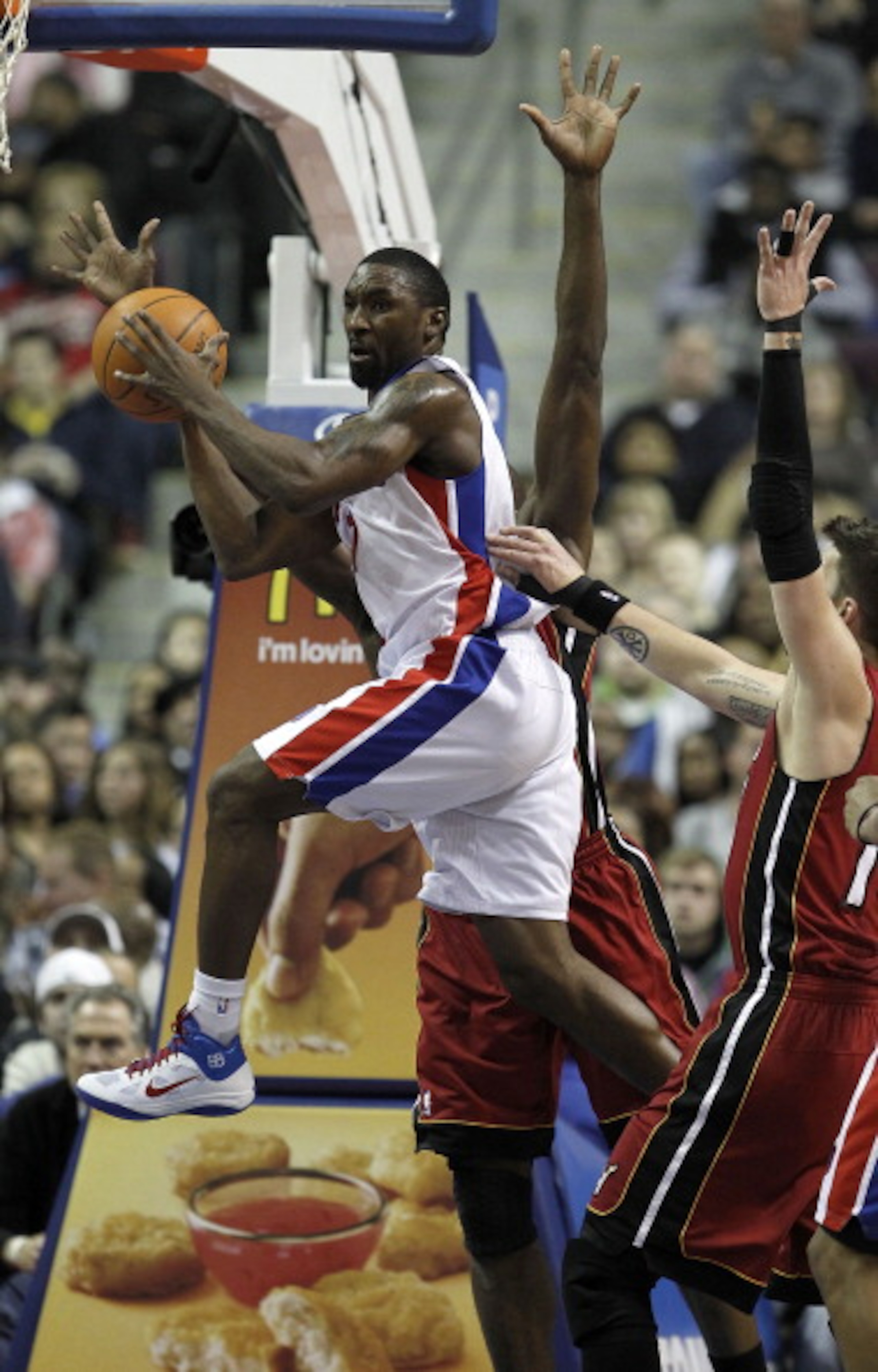 AUBURN HILLS, MI - FEBRUARY 11:  Ben Gordon #7 of the Detroit Pistons looks to pass around Mike Miller #13 of the Miami Heat at The Palace of Auburn Hills on February 11, 2011 in Auburn Hills, Michigan. Miami won the game 106-92. NOTE TO USER: User expres