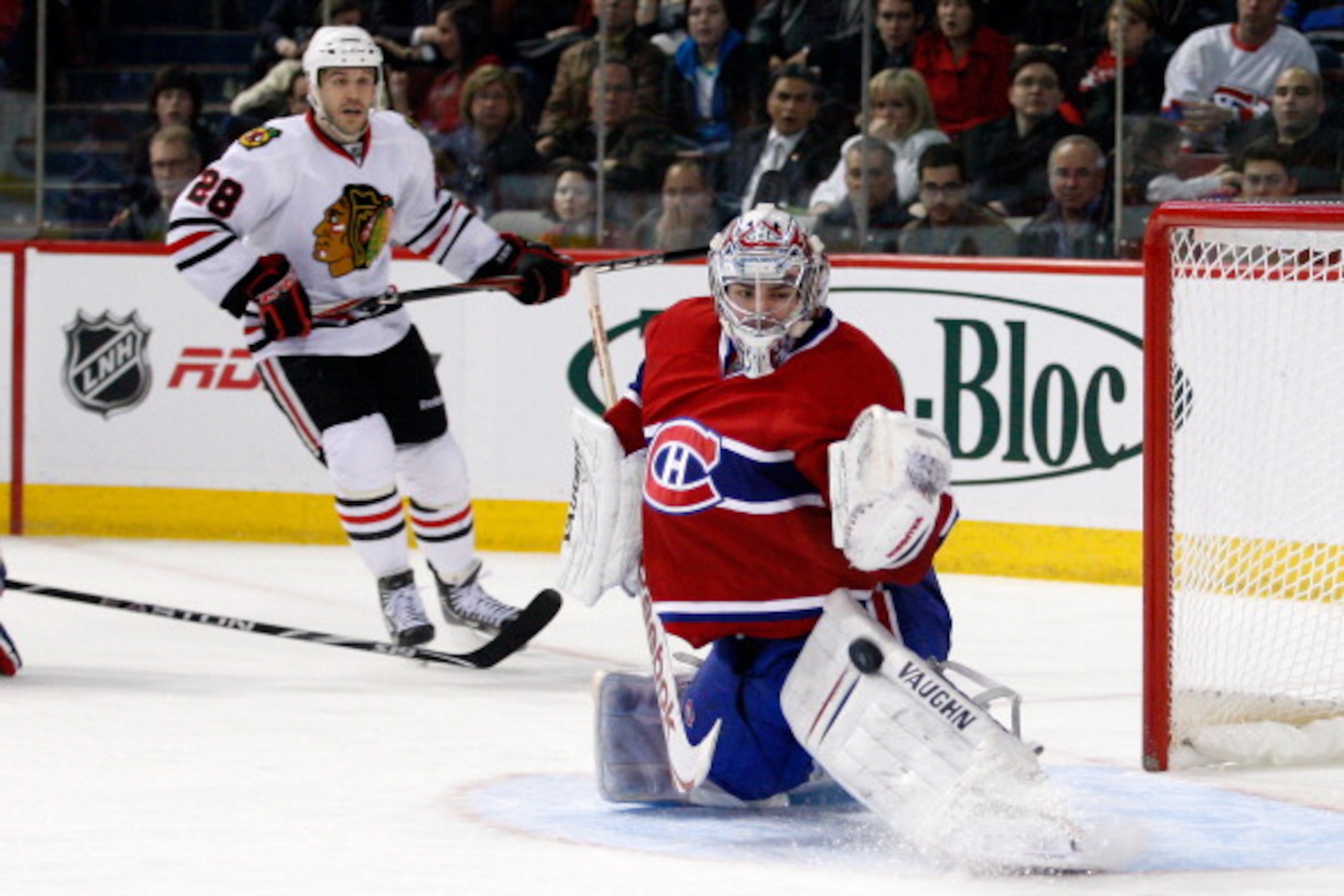 MONTREAL, CANADA - APRIL 5:  Carey Price #31 of the Montreal Canadiens makes a pad save on the puck during the NHL game against the Chicago Blackhawks at the Bell Centre on April 5, 2011 in Montreal, Quebec, Canada.  The Canadiens defeated the Blackhawks