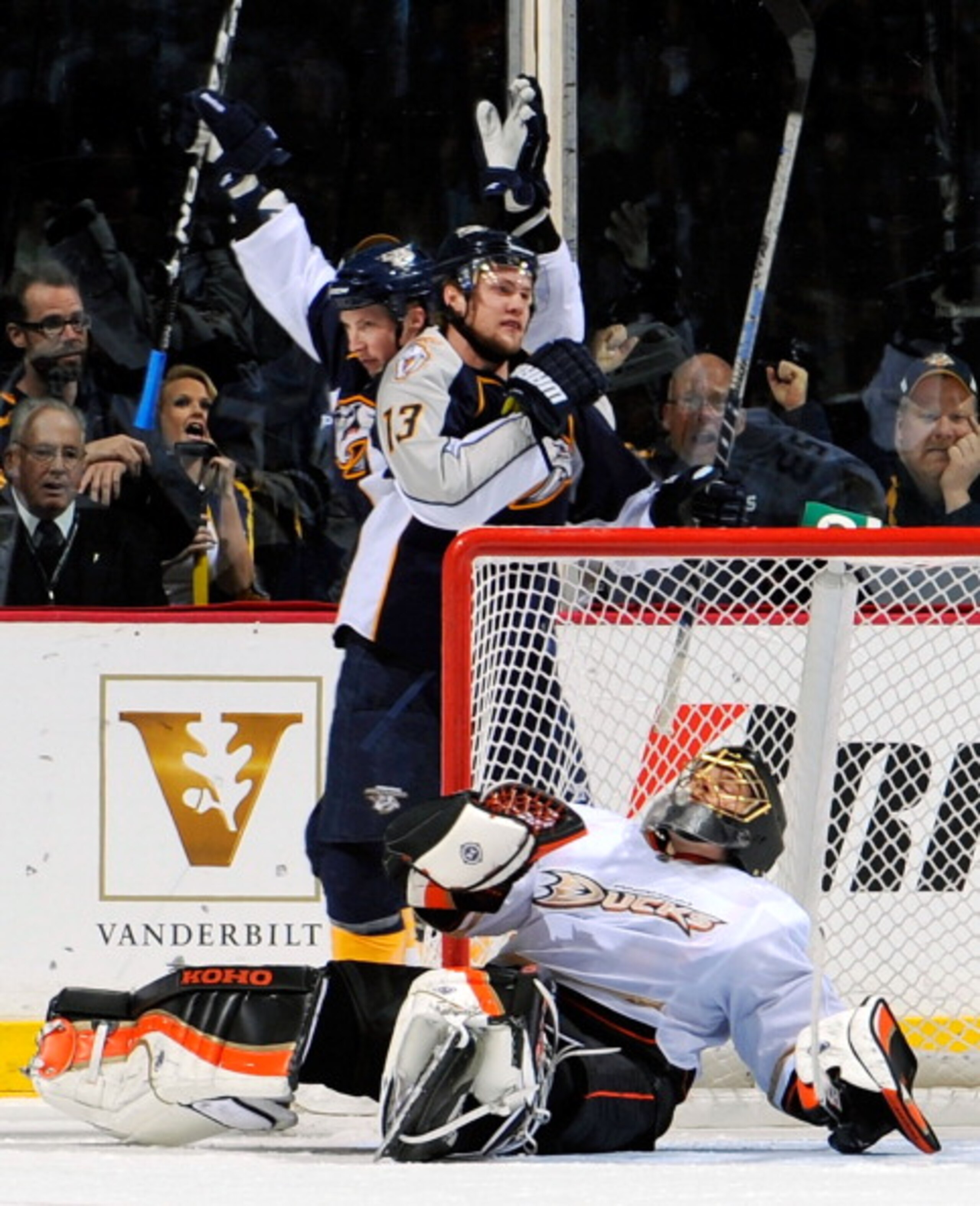 NASHVILLE, TN - MARCH 24:  Jerred Smithson #25 and Nick Spaling #13 of the Nashville Predators celebrate after scoring a goal against Jonas Hiller #1 of the Anaheim Ducks on March 24, 2011 at the Bridgestone Arena in Nashville, Tennessee.  (Photo by Frede