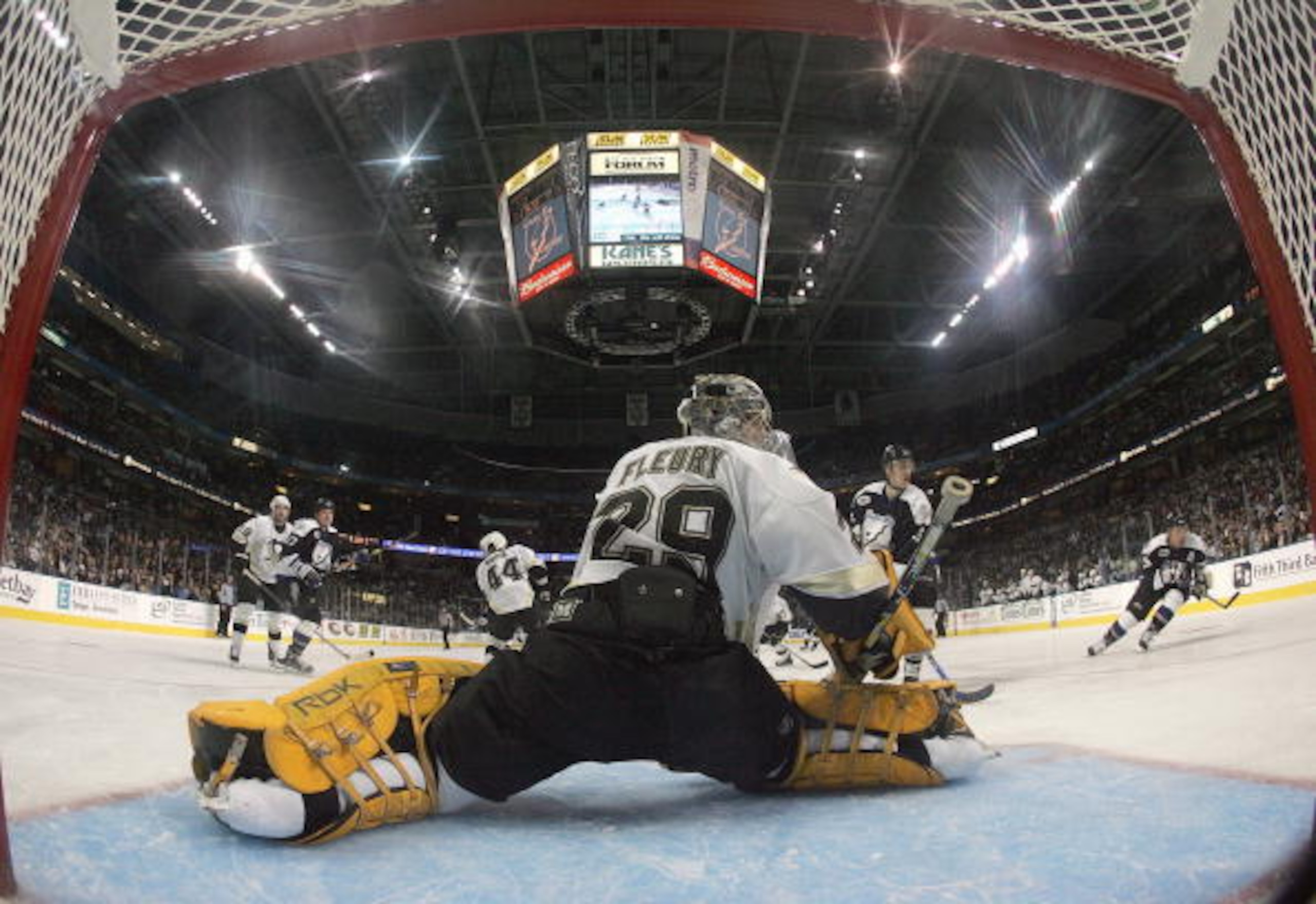 TAMPA, FL - JANUARY 9:  Goaltender Marc-Andre Fleury #29 of the Pittsburgh Penguins stretches to make a save against the Tampa Bay Lightning during their NHL game at the St. Pete Times Forum on January 9, 2007 in Tampa, Florida. The Lightning defeated the