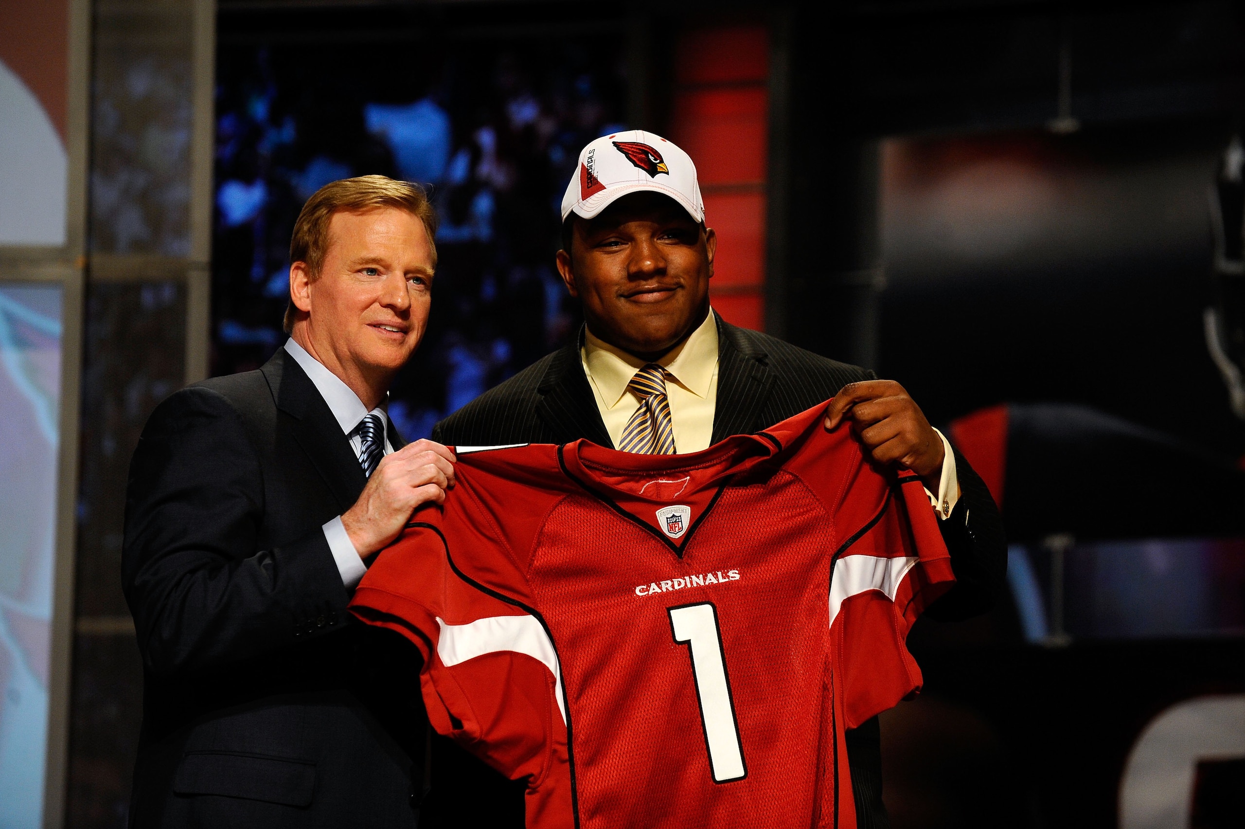 NEW YORK - APRIL 22: Dan Williams from the Tennessee Volunteers poses with NFL Commissioner Roger Goodell as they hold up a Arizona Cardinals jersey after Williams was selected number 26 overall by the Cardinals during the first round of the 2010 NFL Dra NEW YORK - APRIL 22: Dan Williams from the Tennessee Volunteers poses with NFL Commissioner Roger Goodell as they hold up a Arizona Cardinals jersey after Williams was selected number 26 overall by the Cardinals during the first round of the 2010 NFL Dra