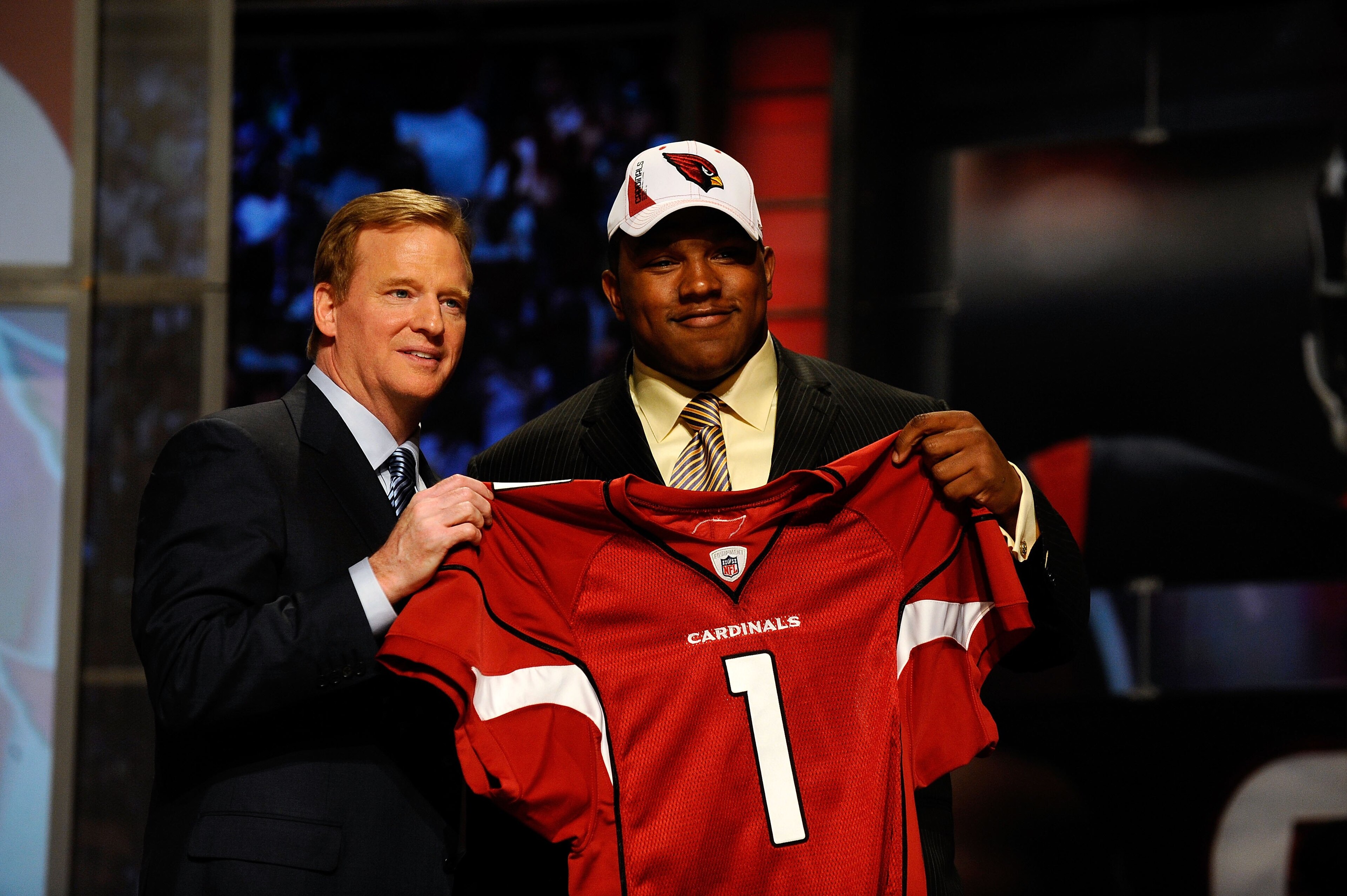 NEW YORK - APRIL 22: Dan Williams from the Tennessee Volunteers poses with NFL Commissioner Roger Goodell as they hold up a Arizona Cardinals jersey after Williams was selected number 26 overall by the Cardinals during the first round of the 2010 NFL Dra NEW YORK - APRIL 22: Dan Williams from the Tennessee Volunteers poses with NFL Commissioner Roger Goodell as they hold up a Arizona Cardinals jersey after Williams was selected number 26 overall by the Cardinals during the first round of the 2010 NFL Dra