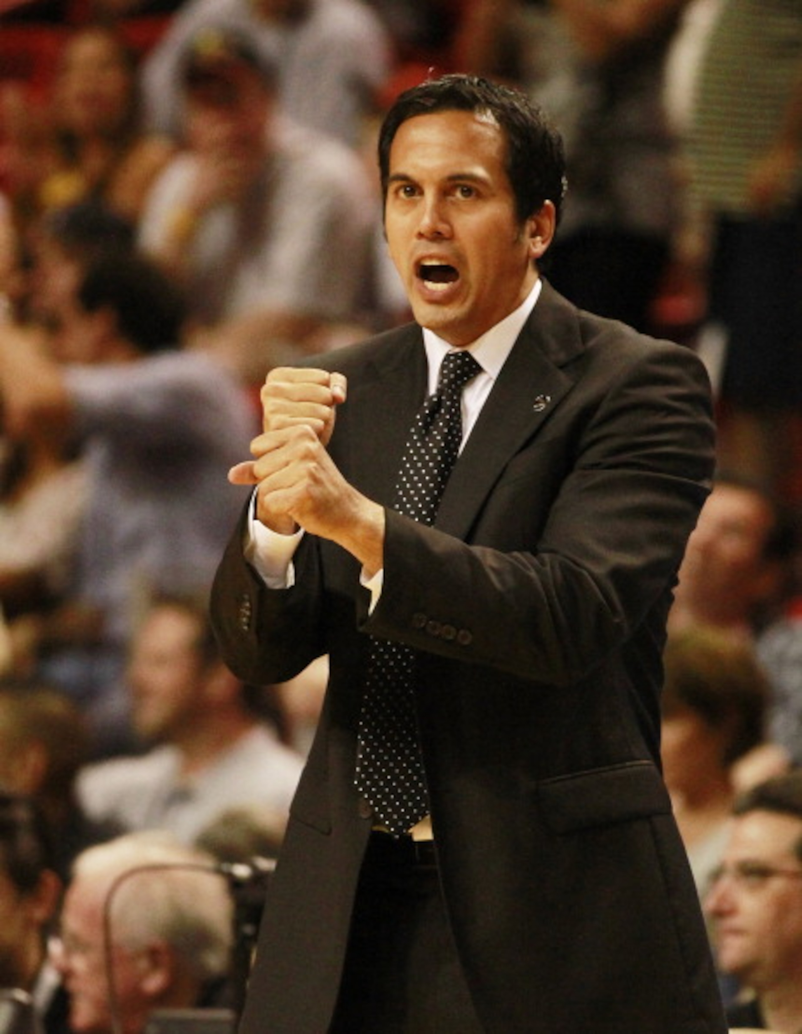 MIAMI, FL - MARCH 25:  Coach Erik Spoelstra of the Miami Heat reacts during a game againts the Philadelphia Sixers at American Airlines Arena on March 25, 2011 in Miami, Florida. The Heat defeated the Sixers 111-99. NOTE TO USER: User expressly acknowledg