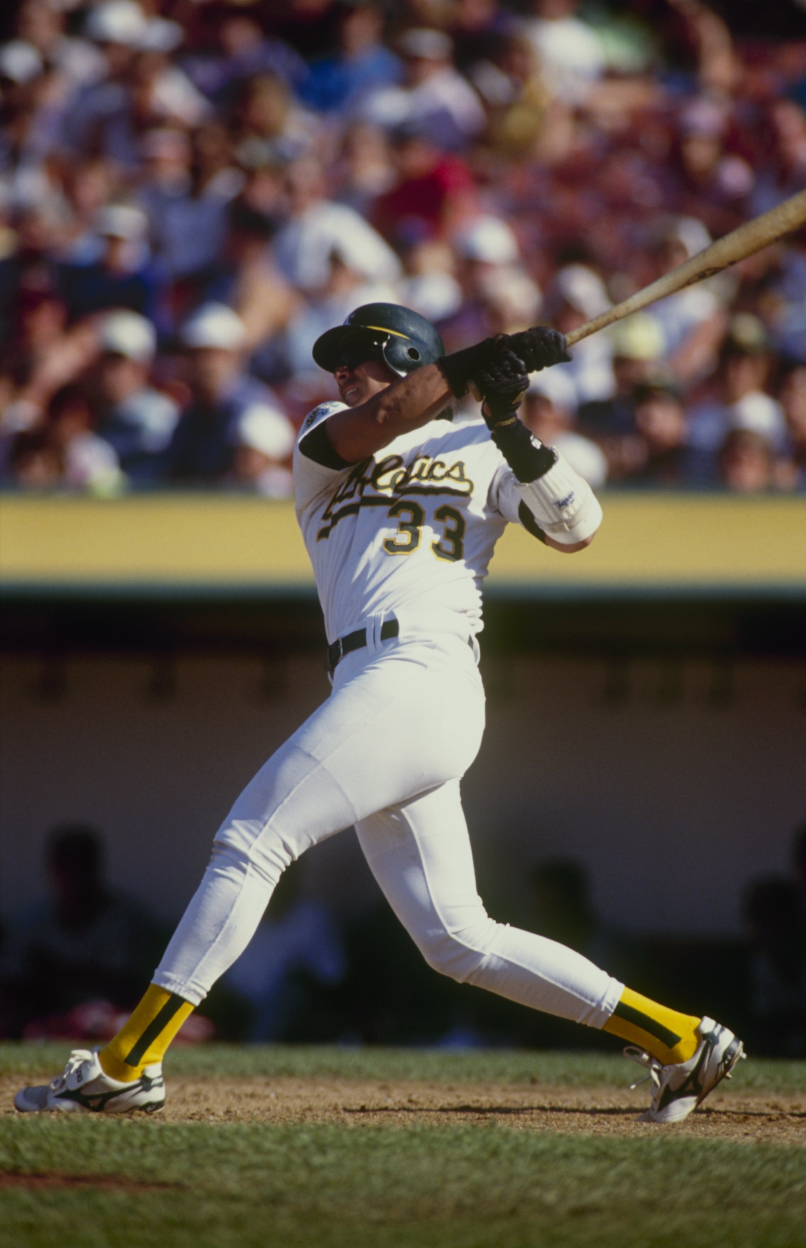OAKLAND, CA - AUGUST 15: Jose Canseco of the Oakland Athletics bats during the game against the California Angels at Oakland-Alameda County Coliseum on August 15, 1992 in Oakland, California. (Photo by Otto Greule Jr/Getty Images) OAKLAND, CA - AUGUST 15: Jose Canseco of the Oakland Athletics bats during the game against the California Angels at Oakland-Alameda County Coliseum on August 15, 1992 in Oakland, California. (Photo by Otto Greule Jr/Getty Images)