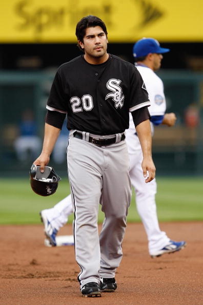 KANSAS CITY - MAY 5:  Carlos Quentin #20 of the Chicago White Sox walks off the field during the game against the Kansas City Royals on May 5, 2009 at Kauffman Stadium in Kansas City, Missouri. (Photo by: Jamie Squire/Getty Images)