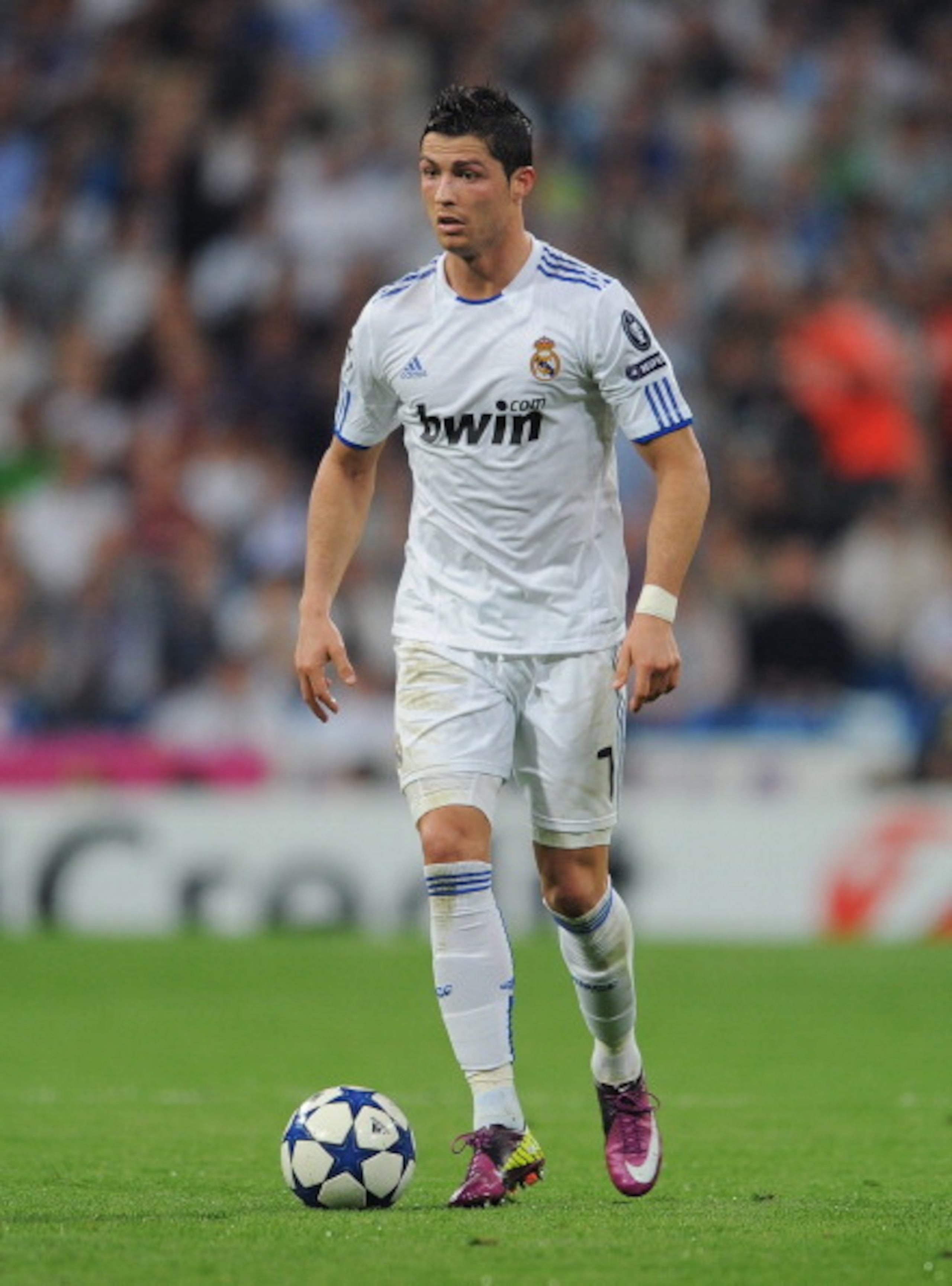 MADRID, SPAIN - APRIL 05:  Cristiano Ronaldo of Real Madrid controls the ball during the UEFA Champions League quarter final first leg match between Real Madrid and Tottenham Hotspur at Estadio Santiago Bernabeu on April 5, 2011 in Madrid, Spain.  (Photo