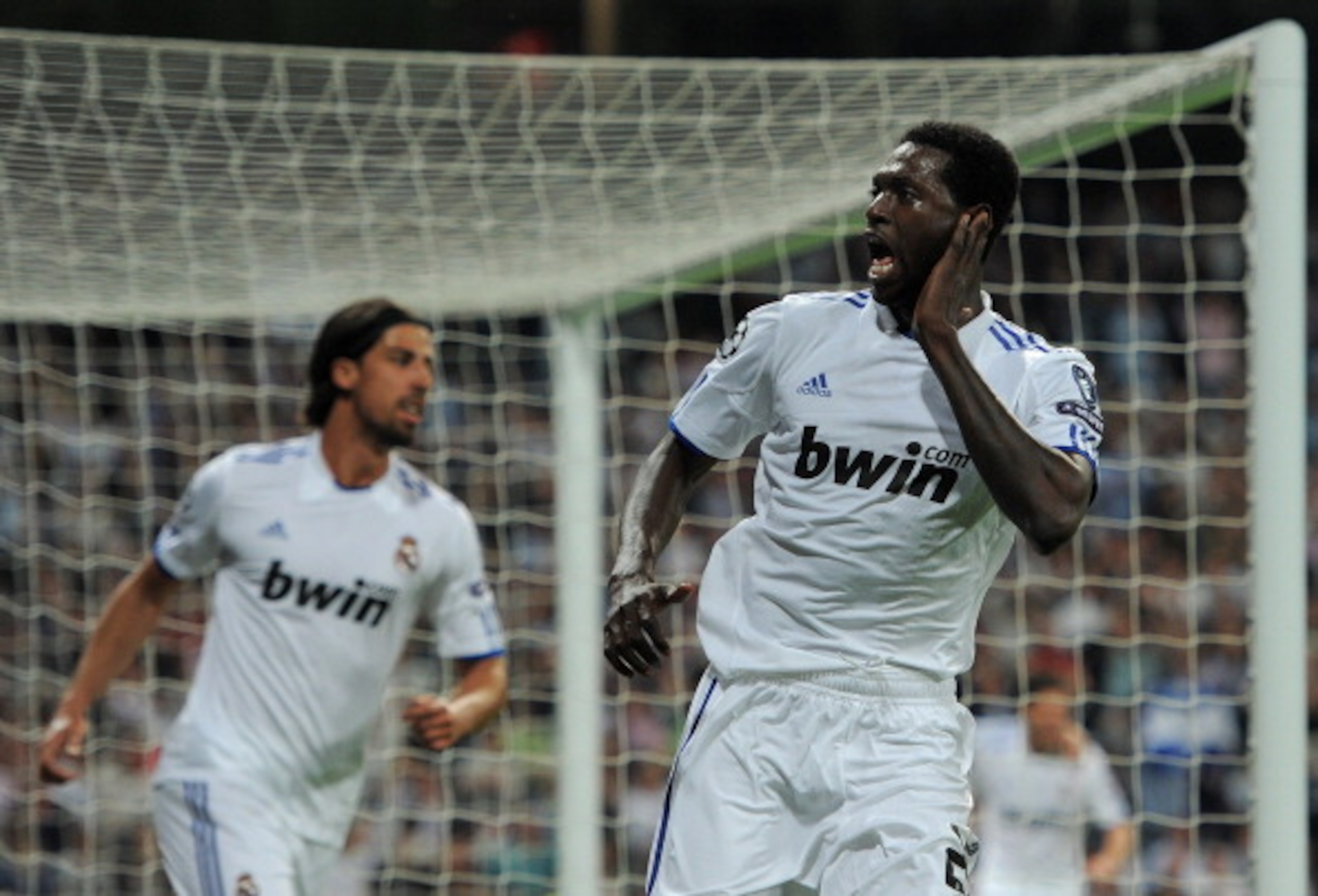 MADRID, SPAIN - APRIL 05:  Emmanuel Adebayor of Real Madrid celebrates scoring his second goal during the UEFA Champions League quarter final first leg match between Real Madrid and Tottenham Hotspur at Estadio Santiago Bernabeu on April 5, 2011 in Madrid