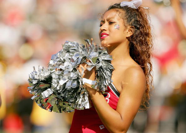 COLLEGE PARK, MD - OCTOBER 1:  A cheerleader for the University of Maryland Terrapins watches the game against the University of Virginia Cavaliers on October 1, 2005 at Byrd Stadium in College Park, Maryland.  Maryland won 45-33.  (Photo by Lisa Blumenfe
