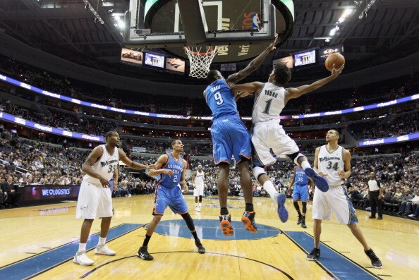 WASHINGTON, DC - MARCH 14: Serge Ibaka #9 of the Oklahoma City Thunder defends against Nick Young #1 of the Washington Wizards during the first half at the Verizon Center on March 14, 2011 in Washington, DC. NOTE TO USER: User expressly acknowledges and a