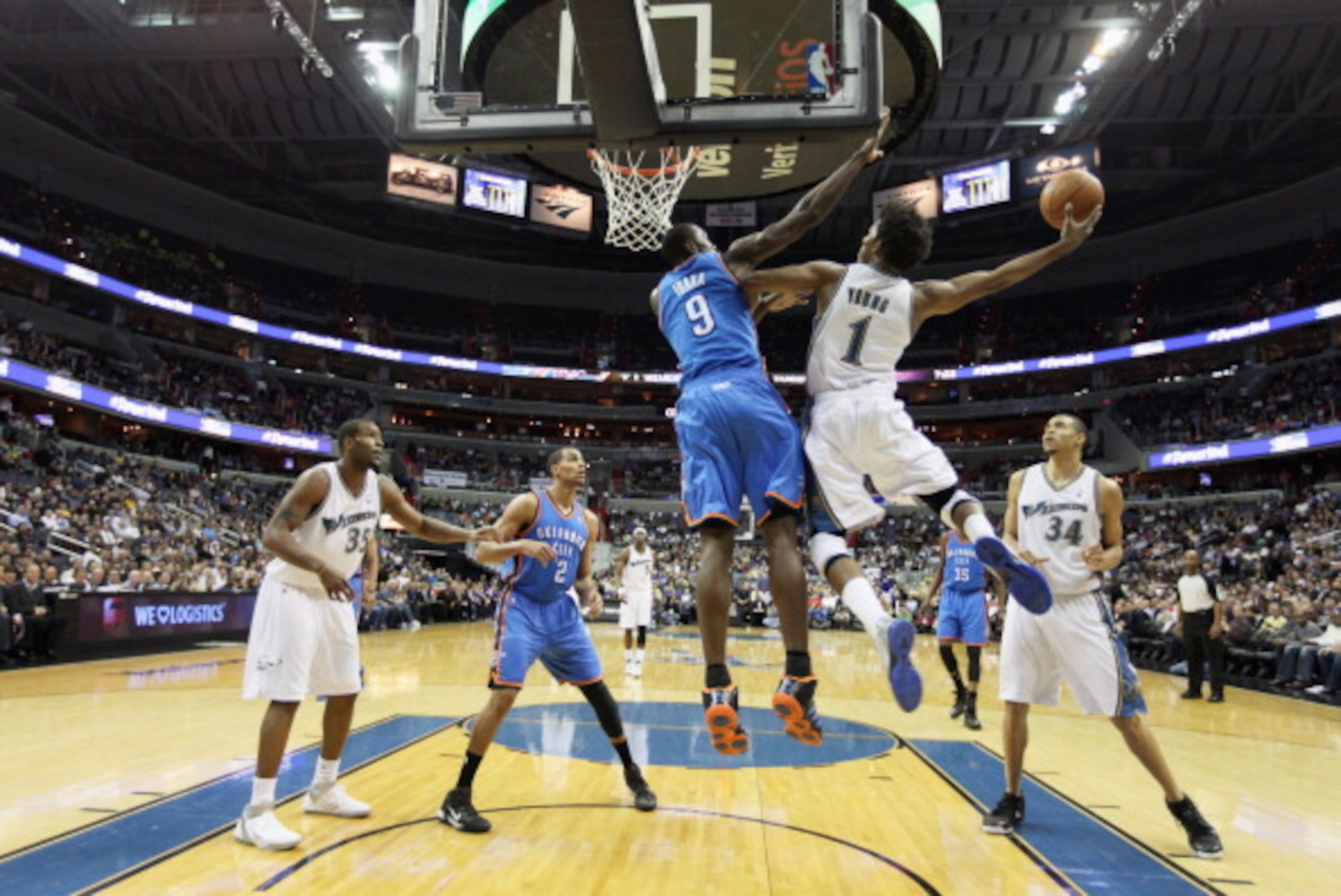 WASHINGTON, DC - MARCH 14: Serge Ibaka #9 of the Oklahoma City Thunder defends against Nick Young #1 of the Washington Wizards during the first half at the Verizon Center on March 14, 2011 in Washington, DC. NOTE TO USER: User expressly acknowledges and a
