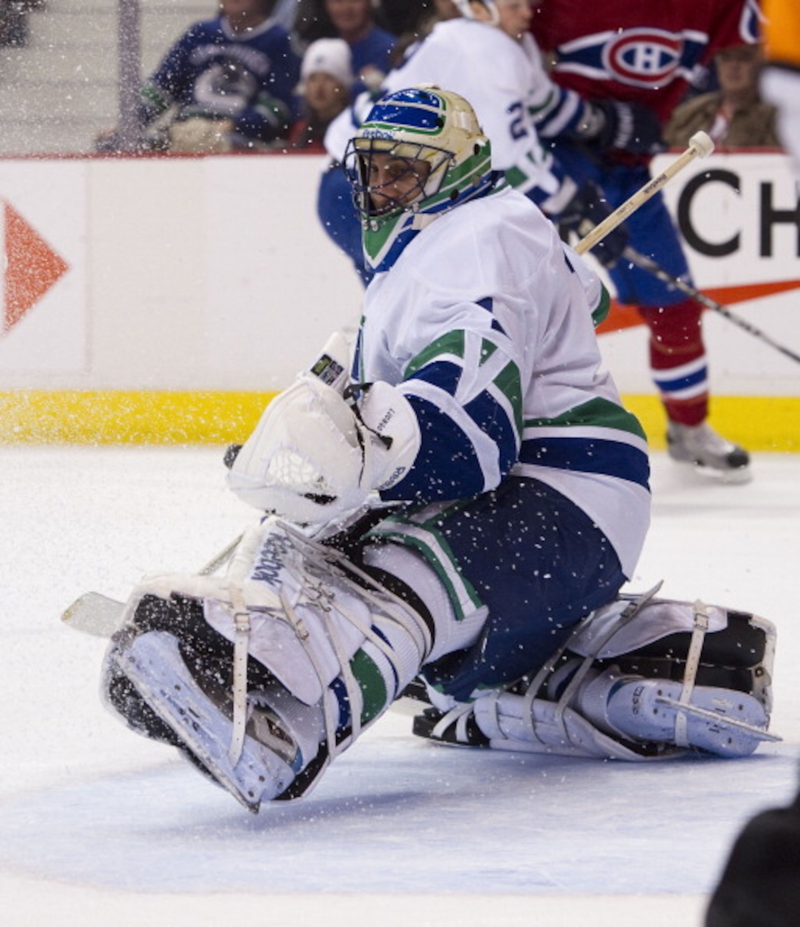 VANCOUVER, CANADA - FEBRUARY 22: Goalie Roberto Luongo #1 of the Vancouver Canucks makes a glove save against the Montreal Canadiens during the first period in NHL action on February 22, 2011 at Rogers Arena in Vancouver, British Columbia, Canada. (Photo VANCOUVER, CANADA - FEBRUARY 22: Goalie Roberto Luongo #1 of the Vancouver Canucks makes a glove save against the Montreal Canadiens during the first period in NHL action on February 22, 2011 at Rogers Arena in Vancouver, British Columbia, Canada. (Photo
