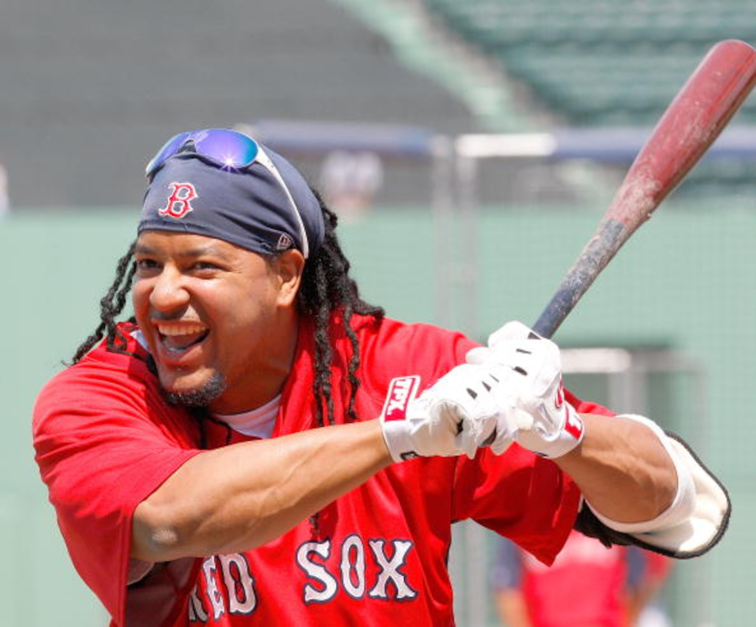 BOSTON - JULY 26: Manny Ramirez #24 of the Boston Red Sox laughs during batting practice before a game with the New York Yankees at Fenway Park on July 26, 2008 in Boston, Massachusetts. (Photo by Jim Rogash/Getty Images) BOSTON - JULY 26: Manny Ramirez #24 of the Boston Red Sox laughs during batting practice before a game with the New York Yankees at Fenway Park on July 26, 2008 in Boston, Massachusetts. (Photo by Jim Rogash/Getty Images)