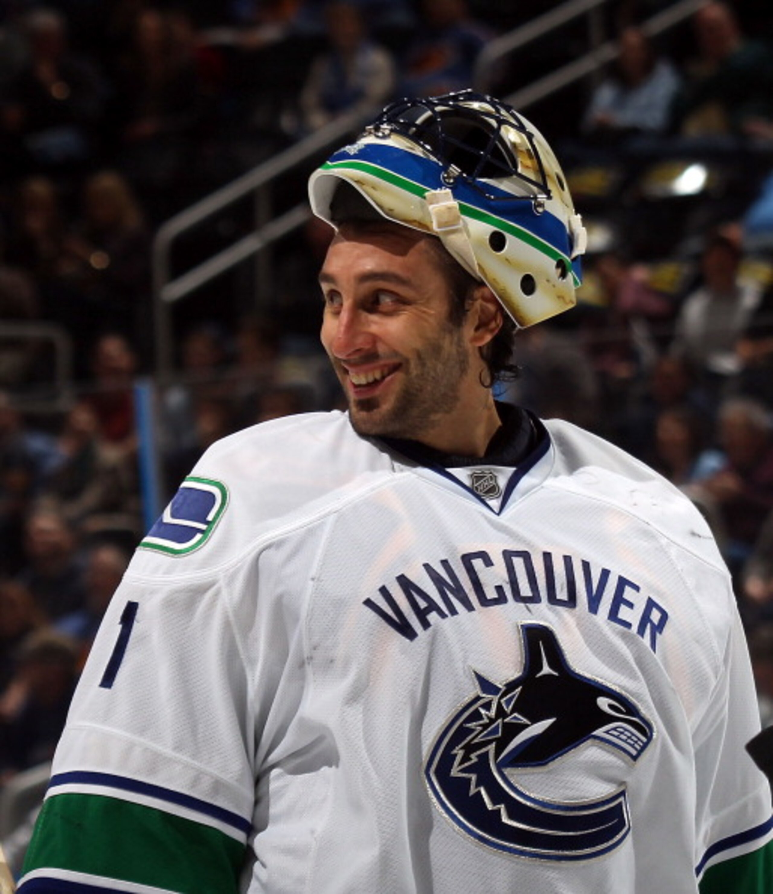 ATLANTA, GA - MARCH 25: Roberto Luongo #1 of the Vancouver Canucks responds to a comment by Dustin Byfuglien #33 of the Atlanta Thrashers during a timeout at the Philips Arena on March 25, 2011 in Atlanta, Georgia. (Photo by Bruce Bennett/Getty Images) ATLANTA, GA - MARCH 25: Roberto Luongo #1 of the Vancouver Canucks responds to a comment by Dustin Byfuglien #33 of the Atlanta Thrashers during a timeout at the Philips Arena on March 25, 2011 in Atlanta, Georgia. (Photo by Bruce Bennett/Getty Images)