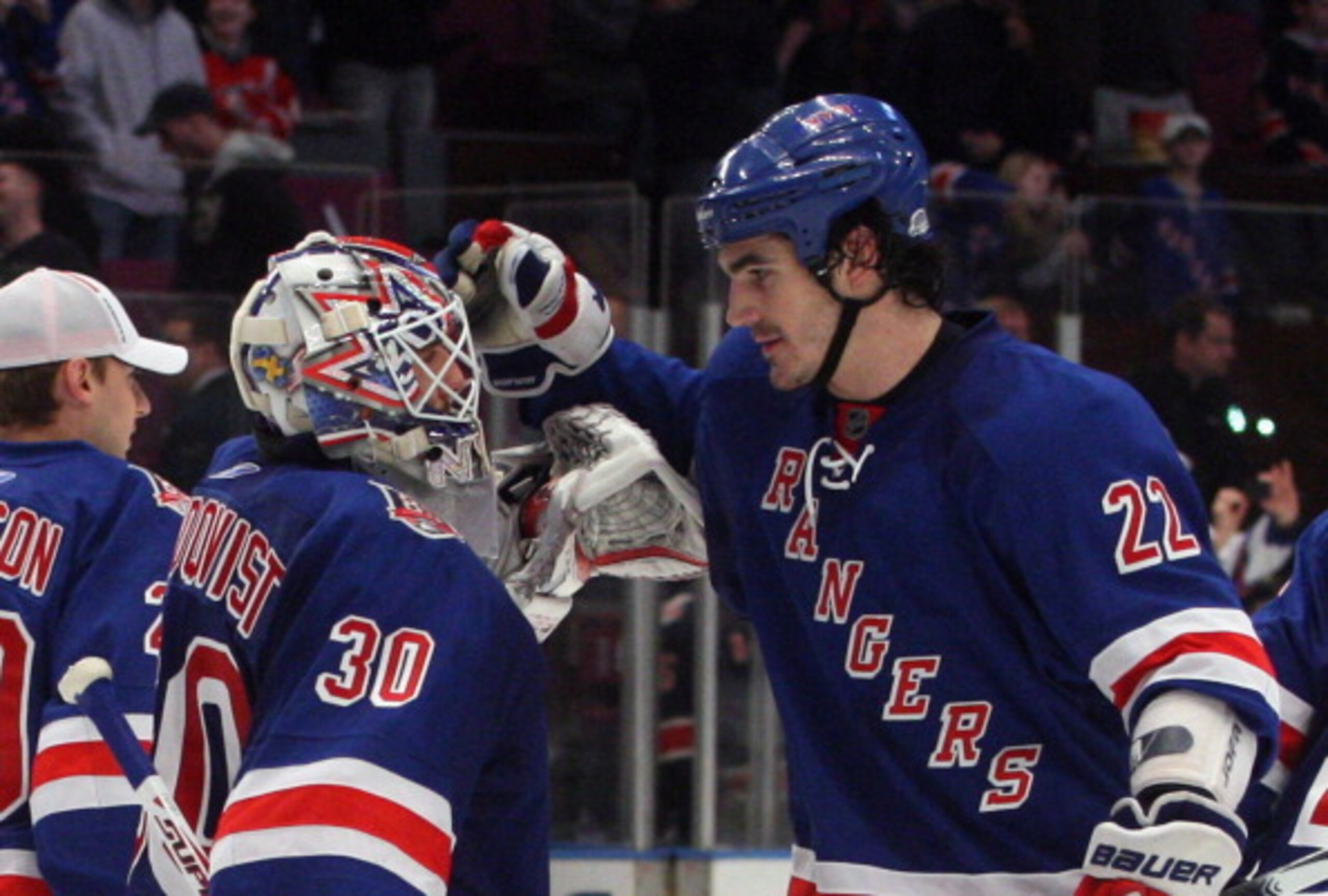 NEW YORK, NY - APRIL 09: Henrik Lundqvist #30 and Brian Boyle #22 of the New York Rangers celebrate their 5-2 victory over the New Jersey Devils at Madison Square Garden on April 9, 2011 in New York City.  (Photo by Jonathan Klein/Getty Images)