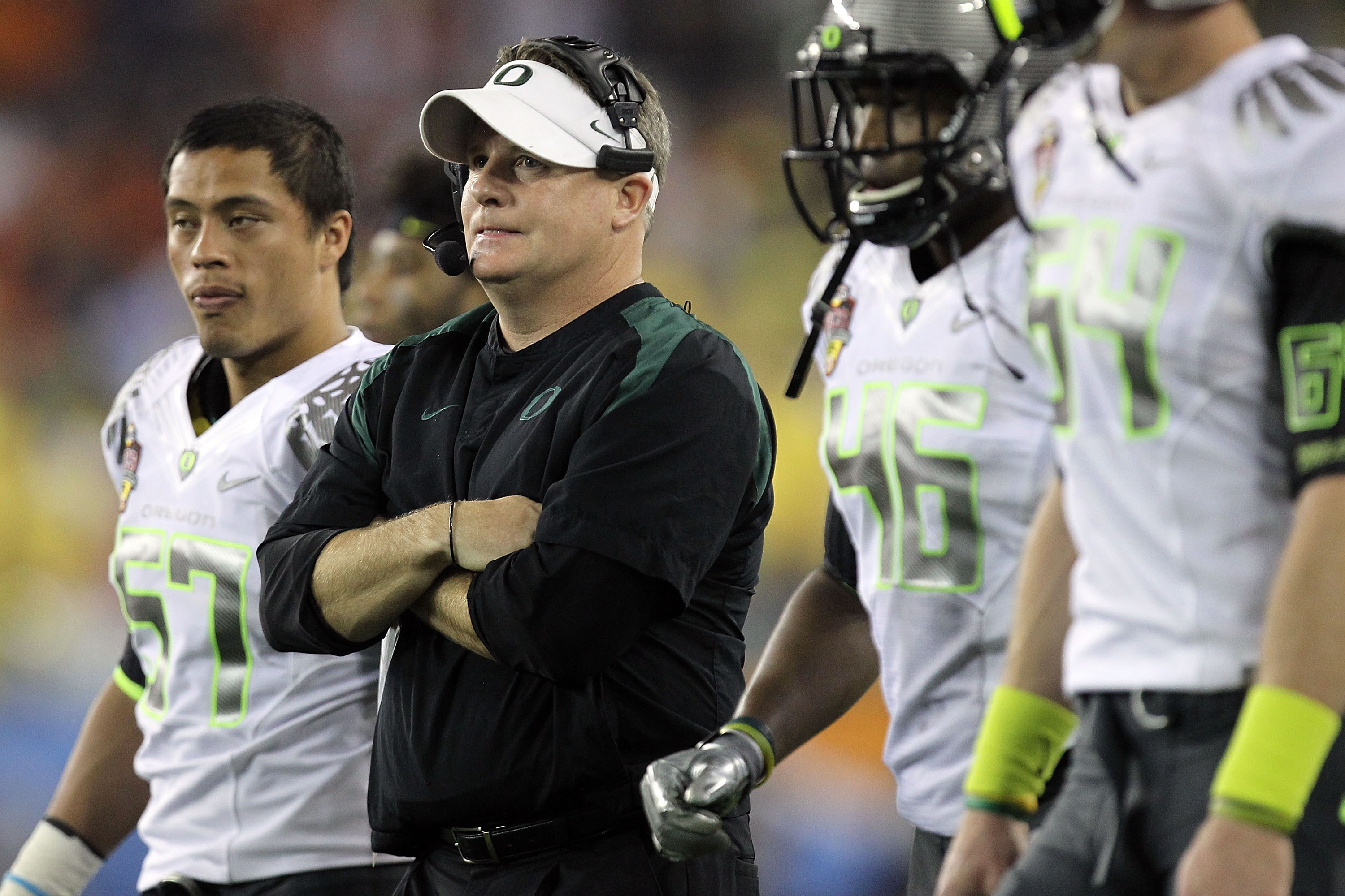 GLENDALE, AZ - JANUARY 10:  Head coach Chip Kelly of the Oregon Ducks looks on against the Auburn Tigers in the Tostitos BCS National Championship Game at University of Phoenix Stadium on January 10, 2011 in Glendale, Arizona.  (Photo by Ronald Martinez/G