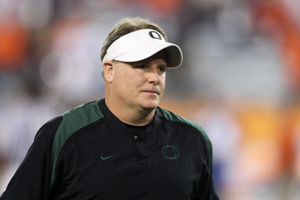 GLENDALE, AZ - JANUARY 10:  Head coach Chip Kelly of the Oregon Ducks looks on during their 22-19 loss to the Auburn Tigers during the Tostitos BCS National Championship Game at University of Phoenix Stadium on January 10, 2011 in Glendale, Arizona.  (Pho