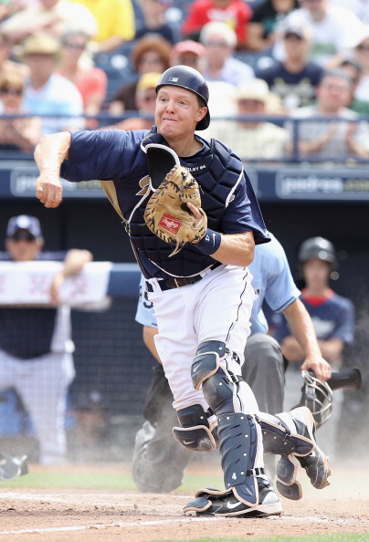 San Diego Padres third baseman Chase Headley doubles during the second  inning of the game with the Arizona Diamondbacks at Petco Park in San Diego  on August 24, 2010. Headley scored on