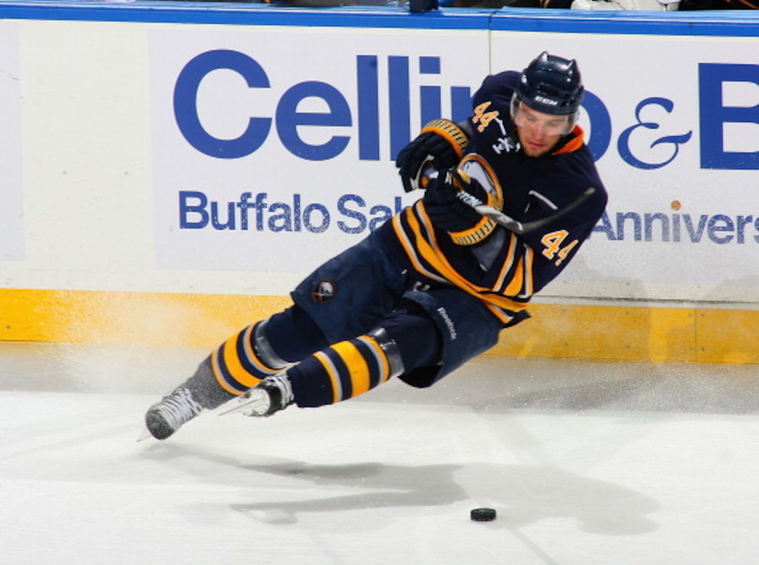 BUFFALO, NY - MARCH 30: Andrej Sekera #44 of the Buffalo Sabres loses an edge an falls to the ice against the New York Rangers at HSBC Arena on March 30, 2011 in Buffalo, New York.  (Photo by Rick Stewart/Getty Images)