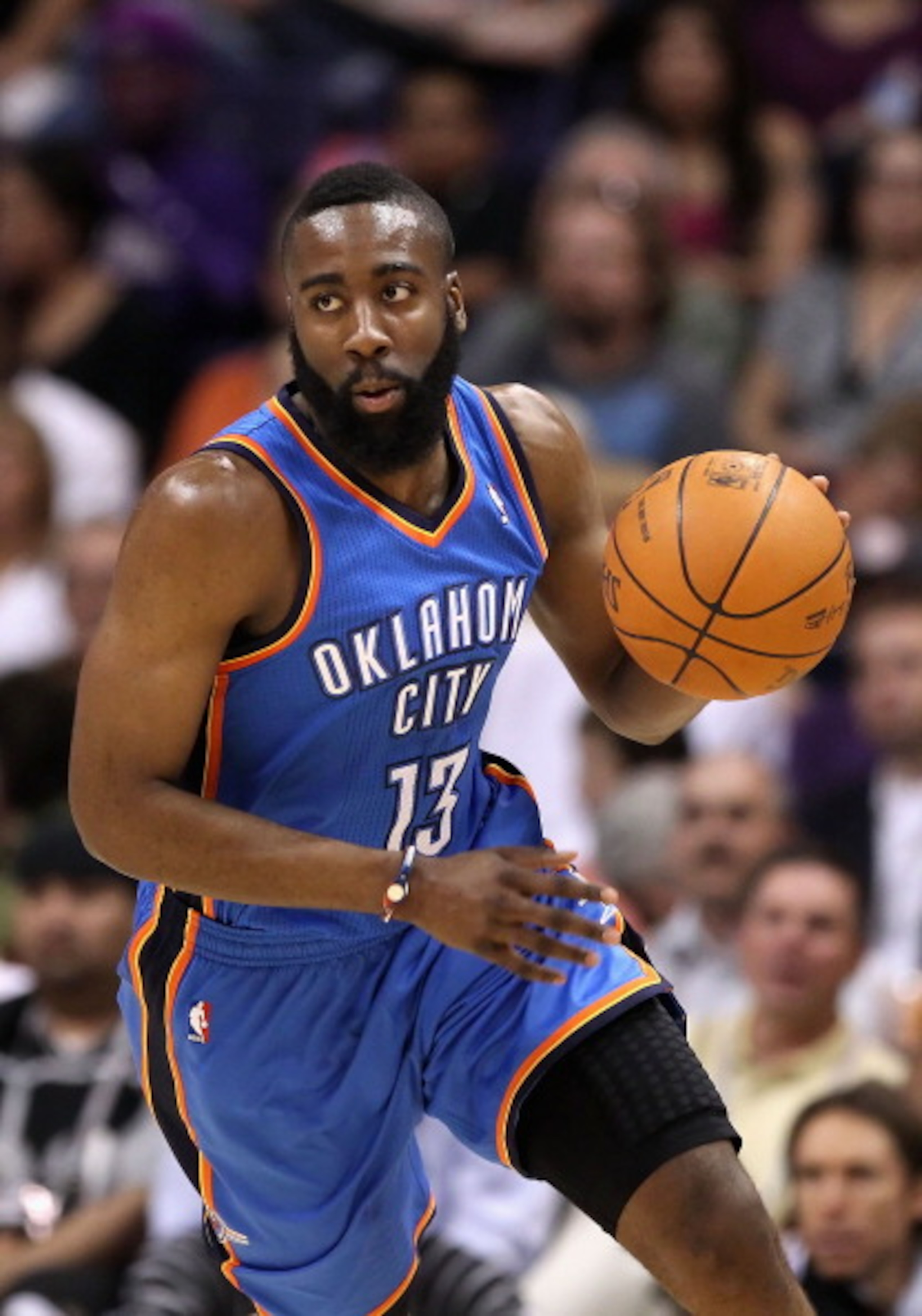 PHOENIX, AZ - MARCH 30:  James Harden #13 of the Oklahoma City Thunder handles the ball during the NBA game against the Phoenix Suns at US Airways Center on March 30, 2011 in Phoenix, Arizona. The Thunder defeated the Suns 116-98.   NOTE TO USER: User exp