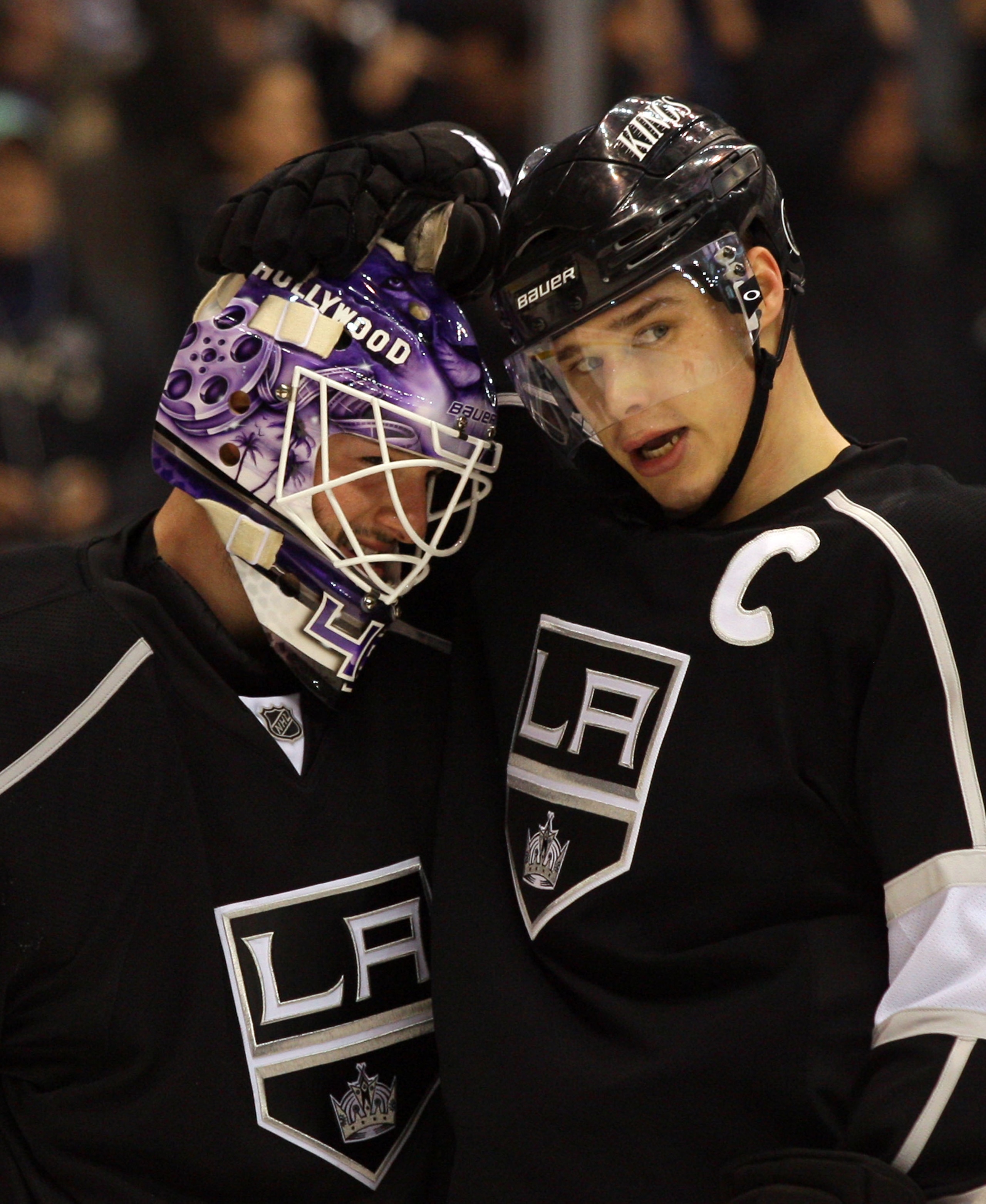 LOS ANGELES, CA - MARCH 03:  Goaltender Jonathan Bernier #45 and Dustin Brown #23 of the Los Angeles Kings celebrate after shutting out and defeating the Phoenix Coyotes 1-0 in their NHL game at Staples Center on March 3, 2011 in Los Angeles, California.