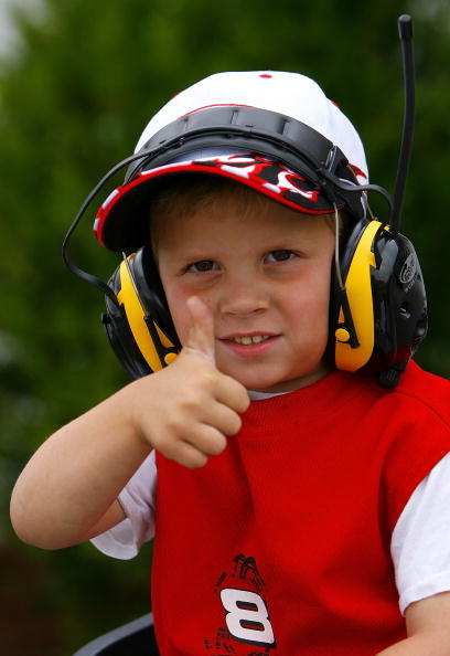 DARLINGTON, SC - MAY 13:  A young NASCAR fan gives the thumbs up, prior to the NASCAR Nextel Cup Series Dodge Avenger 500 on May 13, 2007 at Darlington Raceway in Darlington, South Carolina.   (Photo by Rusty Jarrett/Getty Images for NASCAR)