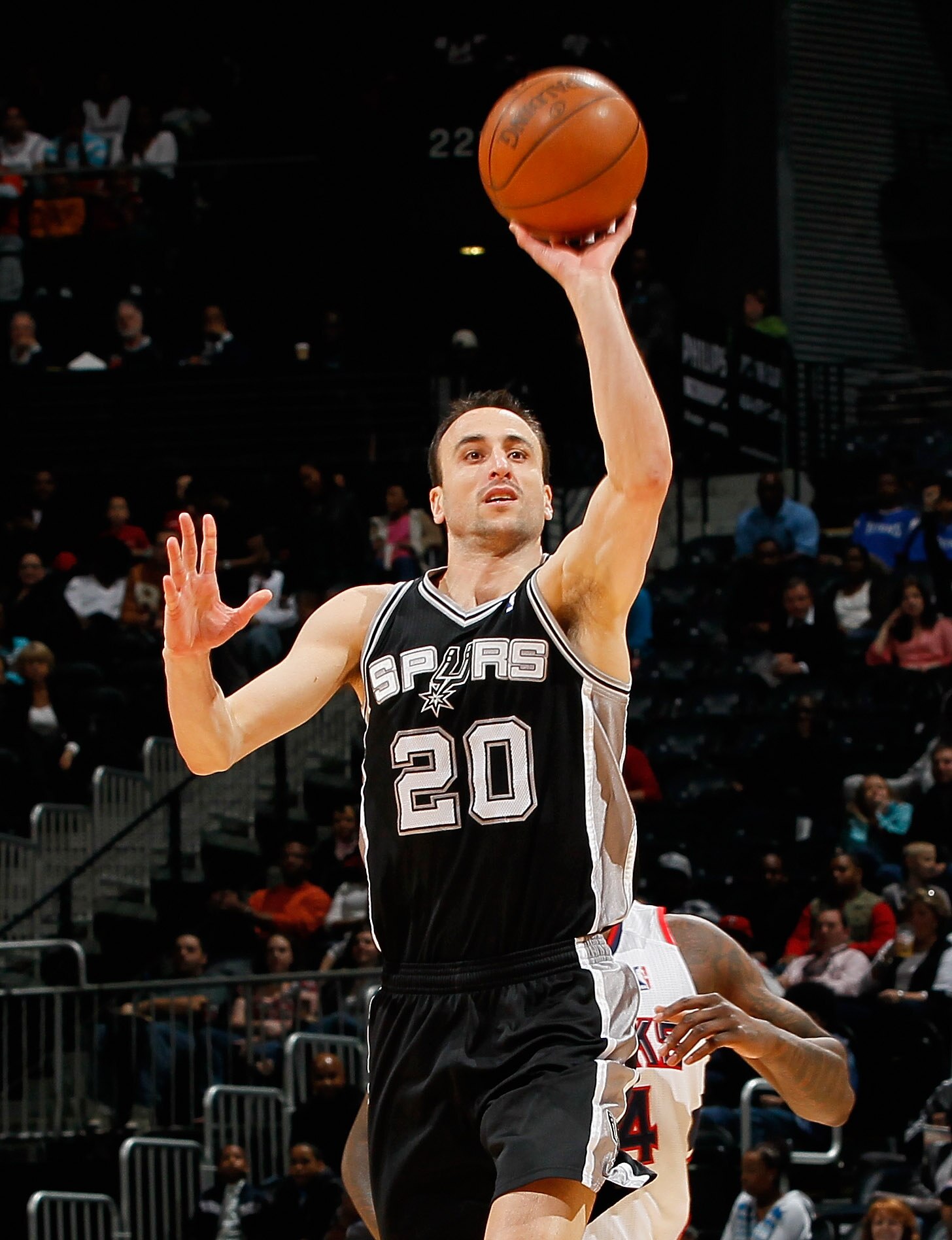 ATLANTA, GA - APRIL 05:  Manu Ginobili #20 of the San Antonio Spurs against the Atlanta Hawks at Philips Arena on April 5, 2011 in Atlanta, Georgia.  NOTE TO USER: User expressly acknowledges and agrees that, by downloading and/or using this Photograph, u