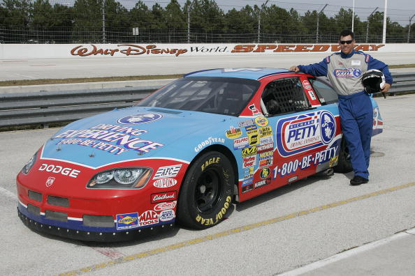 UNITED STATES - OCTOBER 17:  PGA TOUR player Phil Tataurangi poses outside of a Petty race car before members of the PGA TOUR take part in the Richard Petty Driving experience at the Walt Disney World Speedway on Tuesday October 17, 2006.  (Photo by Reinh