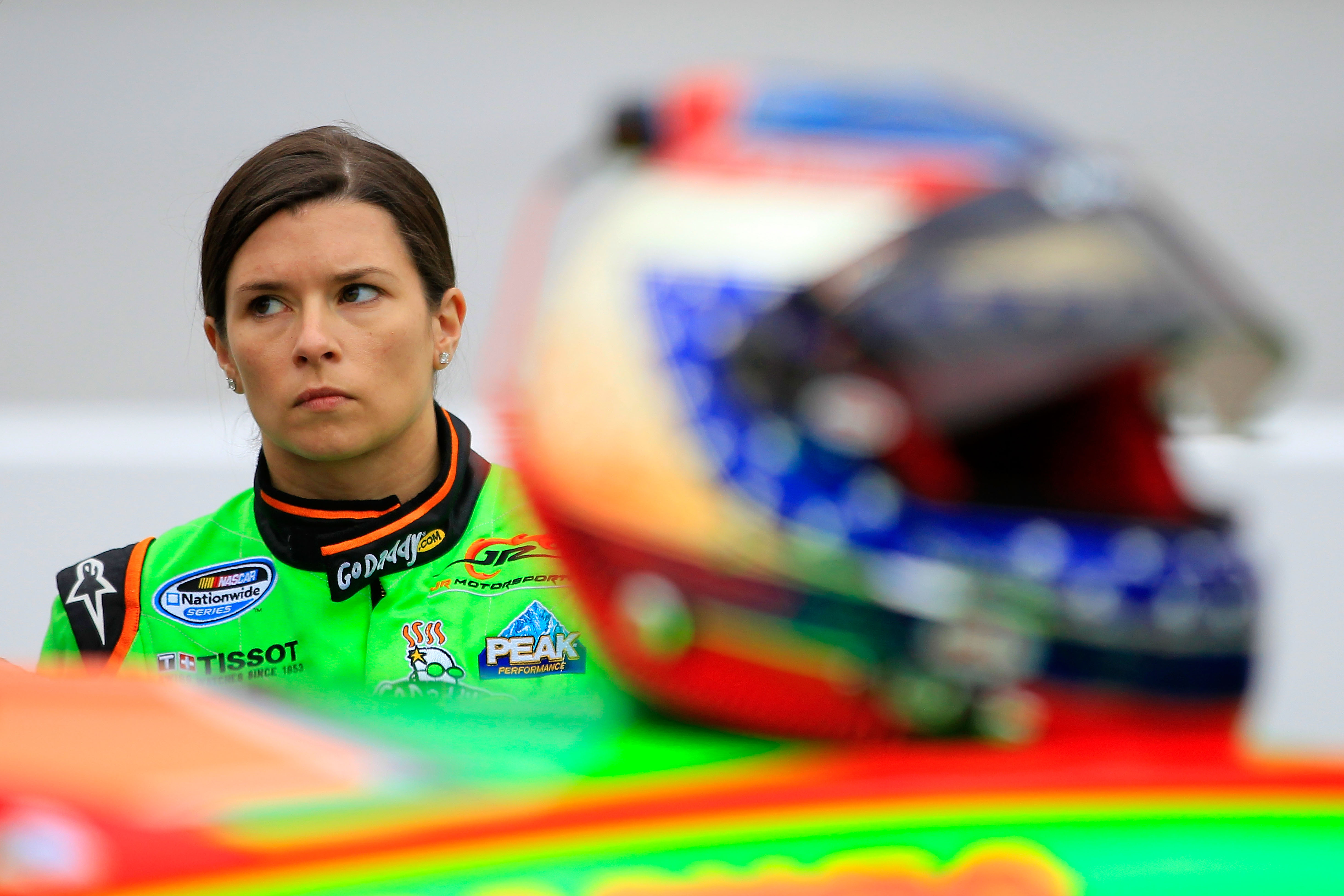 BRISTOL, TN - MARCH 18:  Danica Patrick, driver of the #7 GoDaddy.com Chevrolet, stands in the garage area during practice for the NASCAR Nationwide Series Scotts EZ Seed 300 at Bristol Motor Speedway on March 18, 2011 in Bristol, Tennessee.  (Photo by Ch