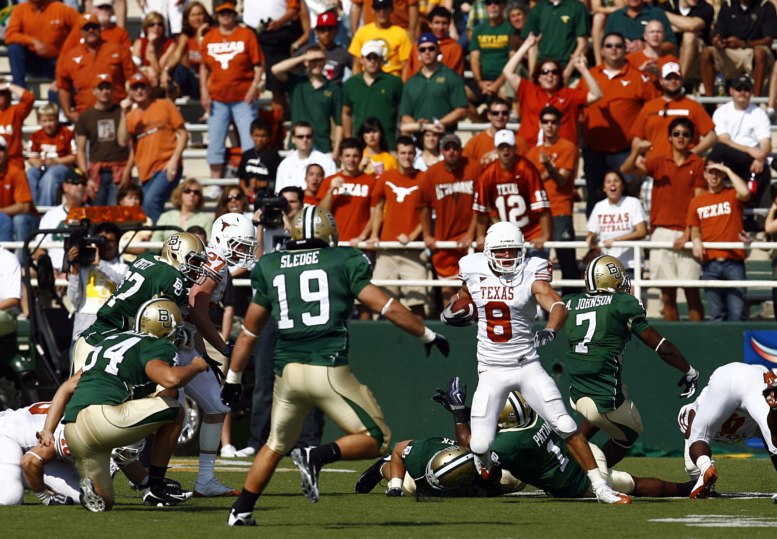 WACO, TX - NOVEMBER 14: Wide receiver Jordan Shipley #8 of the Texas Longhorns carries the ball in the first half against the Baylor Bears on November 14, 2009 at Floyd Casey Stadium in Waco, Texas. The Longhorns beat the Bears 47-14. (Photo by Tom Pe WACO, TX - NOVEMBER 14: Wide receiver Jordan Shipley #8 of the Texas Longhorns carries the ball in the first half against the Baylor Bears on November 14, 2009 at Floyd Casey Stadium in Waco, Texas. The Longhorns beat the Bears 47-14. (Photo by Tom Pe