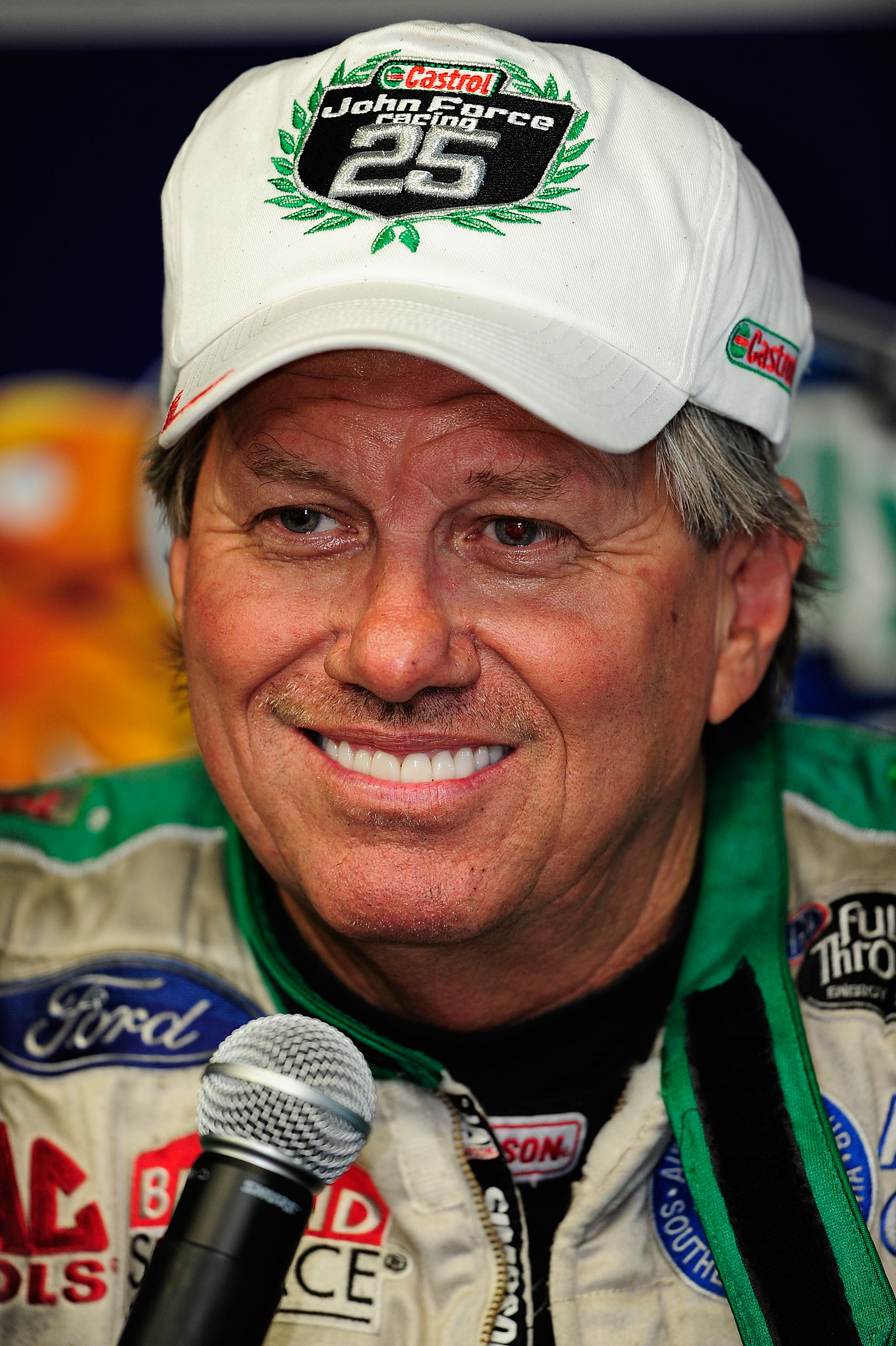 CONCORD, NC - SEPTEMBER 17:  NHRA Funny Car points leader John Force speaks with the media at zMax Dragway on September 17, 2010 in Concord, North Carolina.  (Photo by Rusty Jarrett/Getty Images)