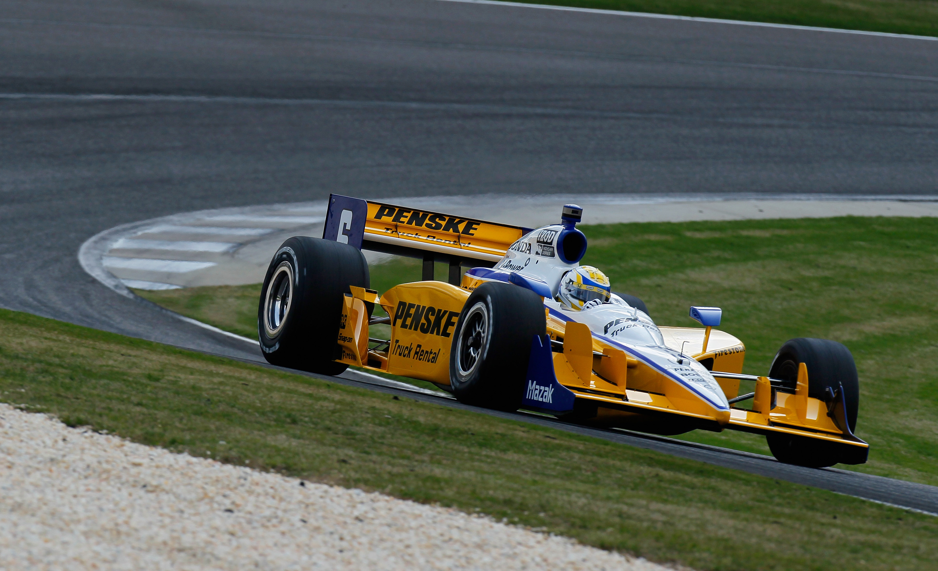 BIRMINGHAM, AL - APRIL 08: Ryan Briscoe of Australia, driver of the #6 Team Penske Dallara Honda, drives during practice for the IndyCar Series Honda Indy Grand Prix of Alabama at Barber Motorsports Park on April 8, 2011 in Birmingham, Alabama. (Photo b