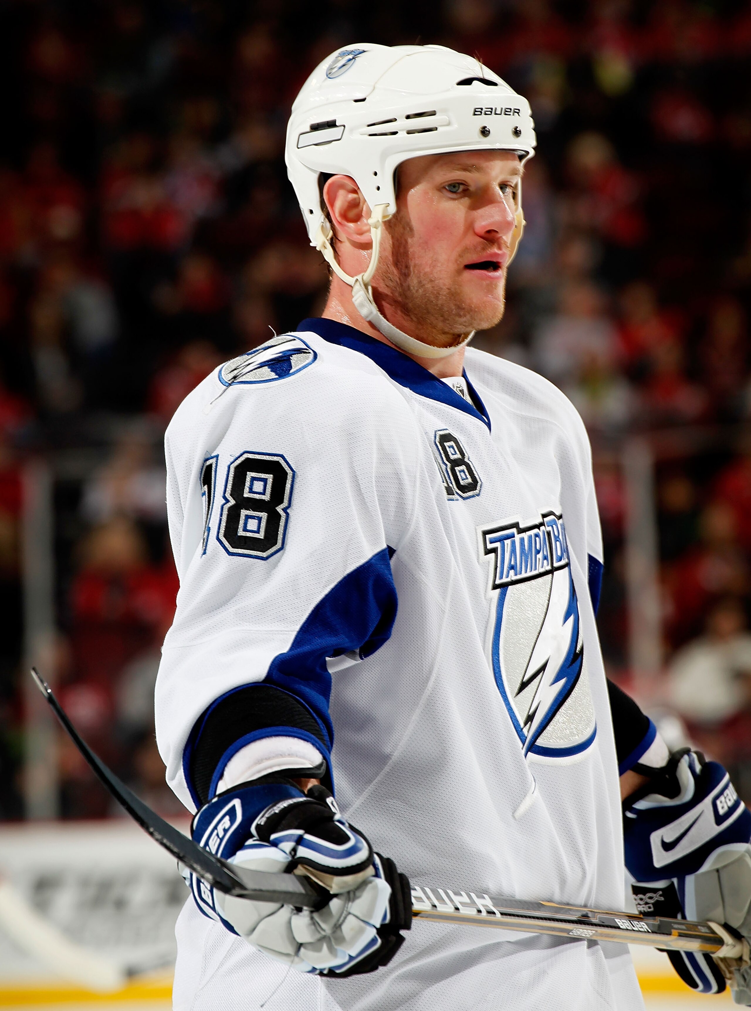 NEWARK, NJ - JANUARY 09:  Adam Hall #18 of the Tampa Bay Lightning waits for a faceoff during an NHL hockey game against the New Jersey Devils at the Prudential Center on January 9, 2011 in Newark, New Jersey.  (Photo by Paul Bereswill/Getty Images)