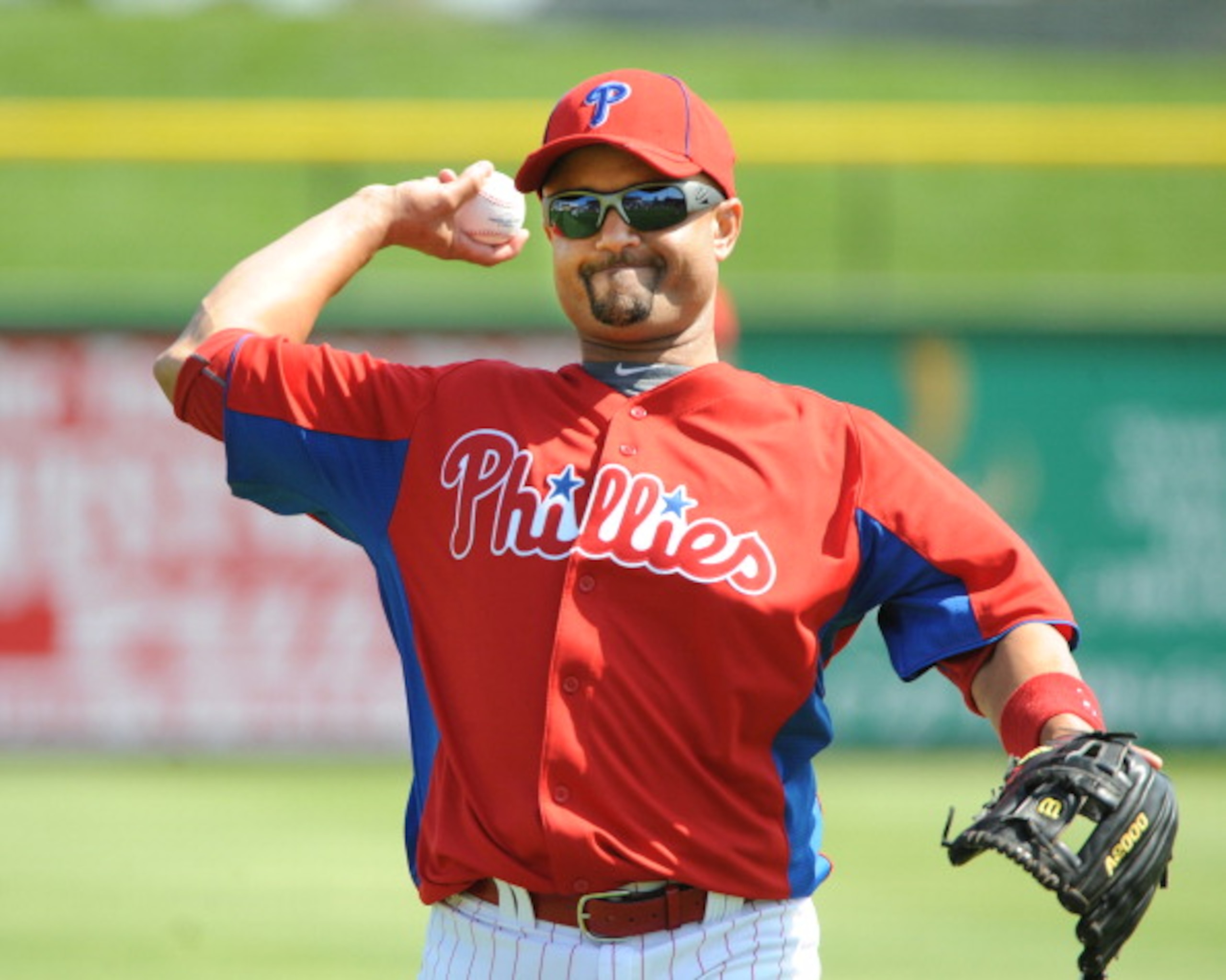 CLEARWATER, FL - FEBRUARY 24:  Infielder Placido Polanco #27 of the Philadelphia Phillies warms up for play against the Florida State Seminoles February 24, 2011 at Bright House Field in Clearwater, Florida.  (Photo by Al Messerschmidt/Getty Images)