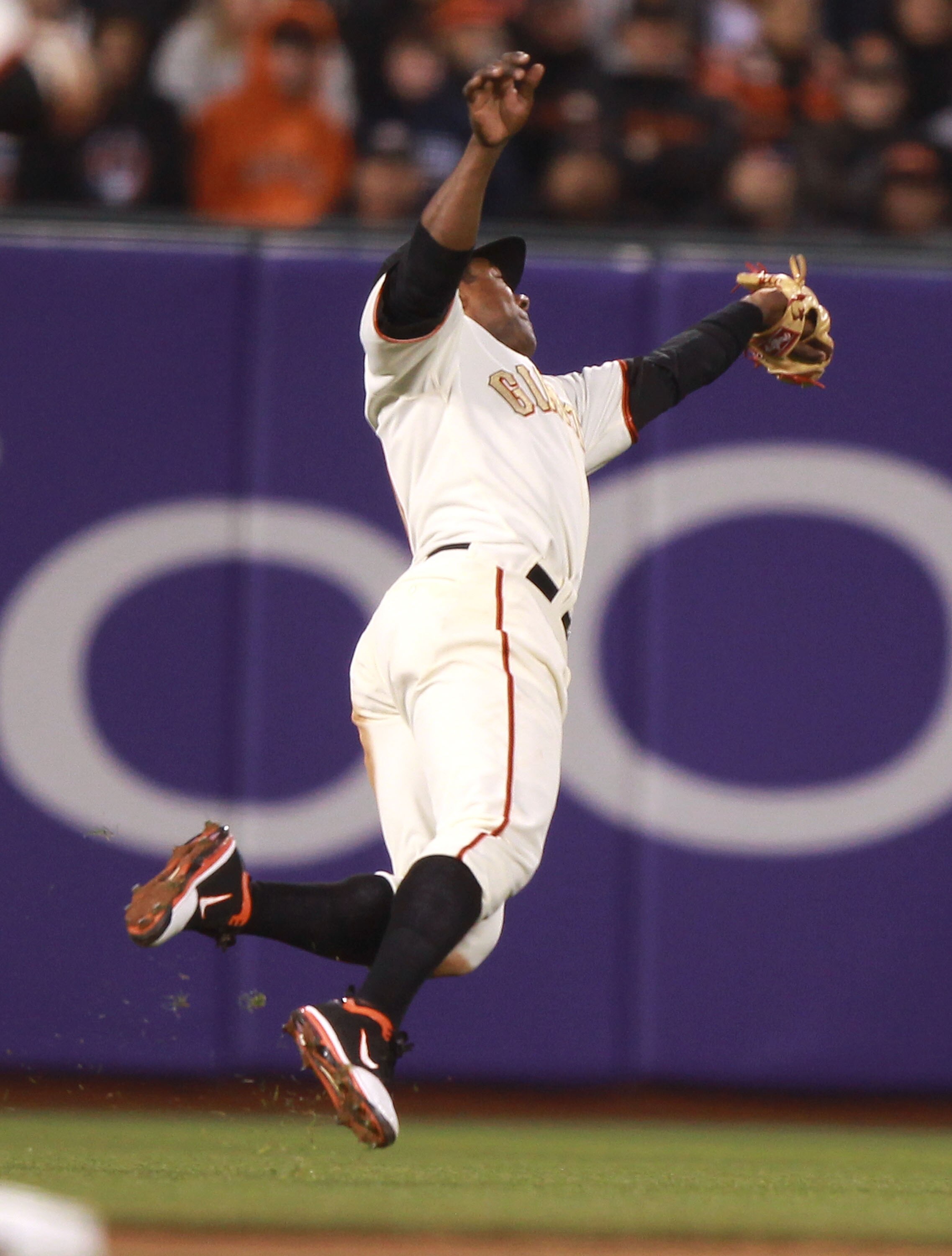 SAN FRANCISCO, CA - APRIL 09:  Miguel Tejada #10 of the San Francisco Giants catches a ball hit by Colby Rasmus of the St. Louis Cardinals in the fourth inning at AT&T Park on April 9, 2011 in San Francisco, California.  (Photo by Jed Jacobsohn/Getty Imag