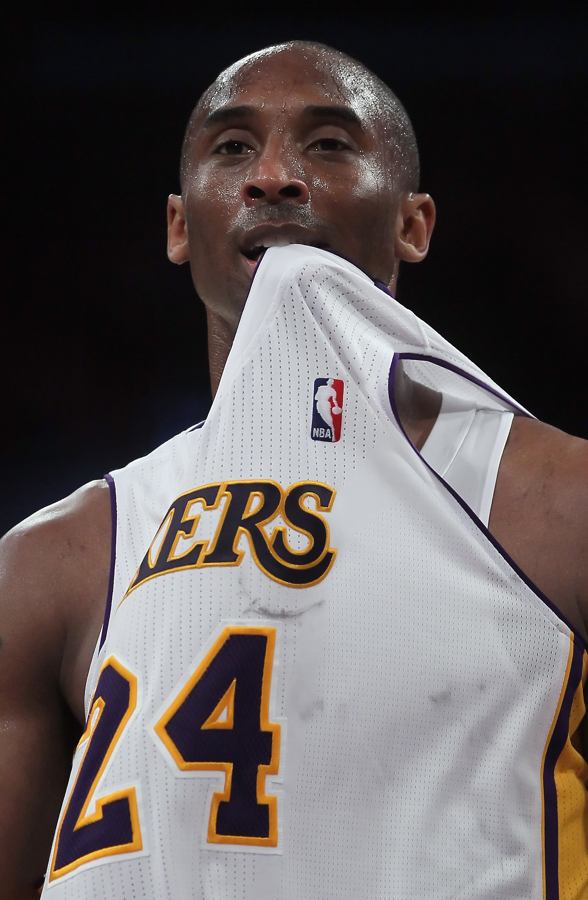 LOS ANGELES, CA - APRIL 10:  Kobe Bryant #24 of the Los Angeles Lakers puts his jersey in his mouth after committing a foul in the second half against the Oklahoma City Thunder at Staples Center on April 10, 2011 in Los Angeles, California. The Thunder de