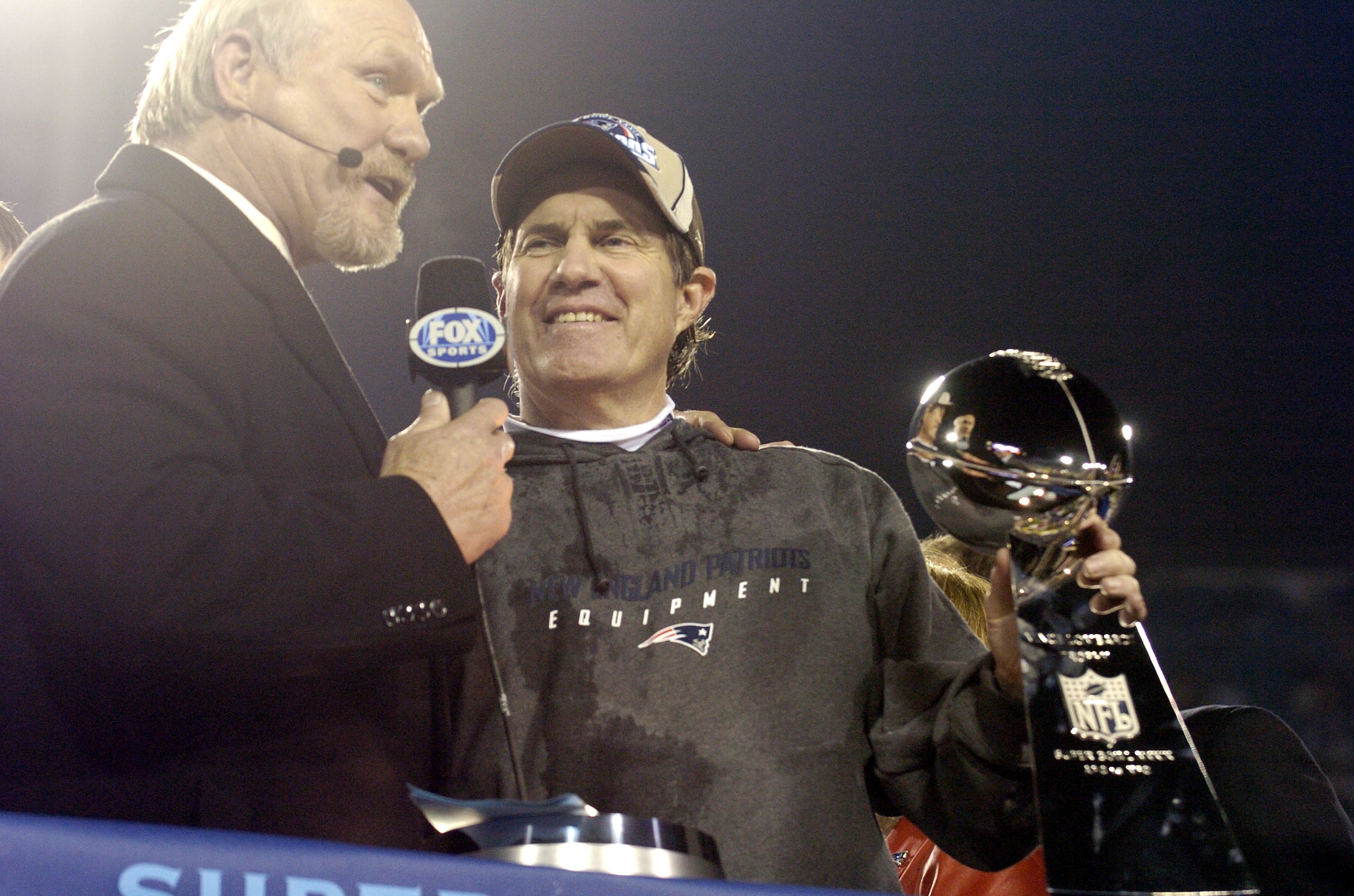 New England Patriots Head Coach Bill Belichick holds The Vince Lombardi Trophy after the Patriots won Super Bowl XXXIX at Alltel Stadium in Jacksonville, Florida on February 6, 2005. (Photo by Al Messerschmidt/Getty Images) New England Patriots Head Coach Bill Belichick holds The Vince Lombardi Trophy after the Patriots won Super Bowl XXXIX at Alltel Stadium in Jacksonville, Florida on February 6, 2005. (Photo by Al Messerschmidt/Getty Images)