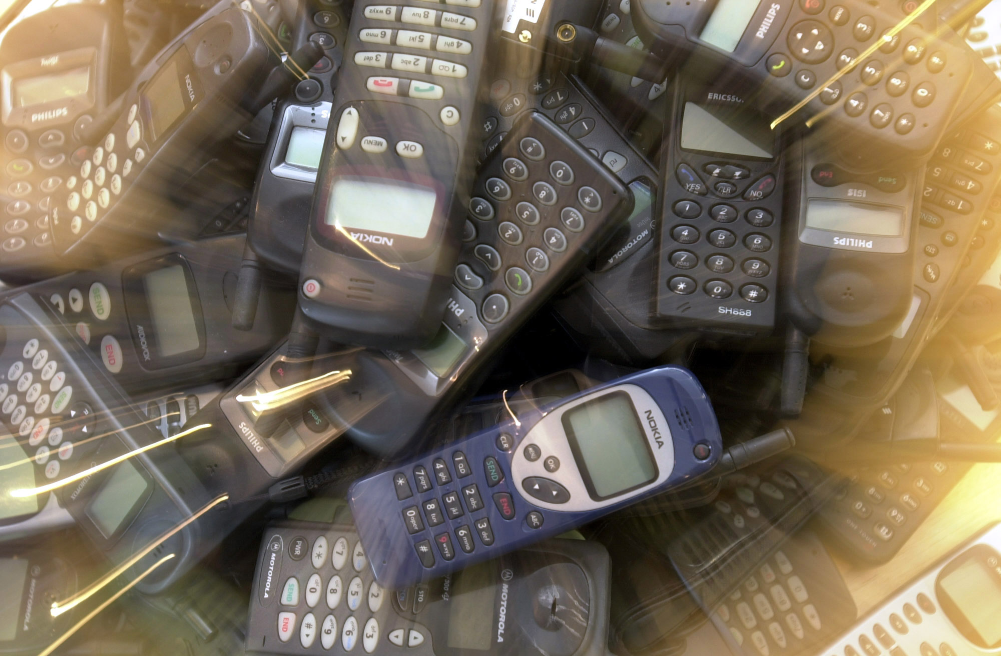 WELLINGTON, NEW ZEALAND - JULY 03:  Lost Cellphones bound for recycling in Singapore.  (Photo by Ross Land/Getty Images)
