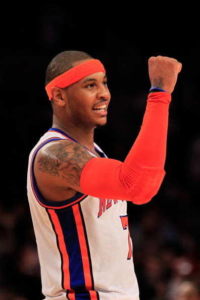 NEW YORK, NY - MARCH 30:  Carmelo Anthony #7 of the New York Knicks celebrates during the game against the New Jersey Nets at Madison Square Garden on March 30, 2011 in New York City. NOTE TO USER: User expressly acknowledges and agrees that, by downloadi