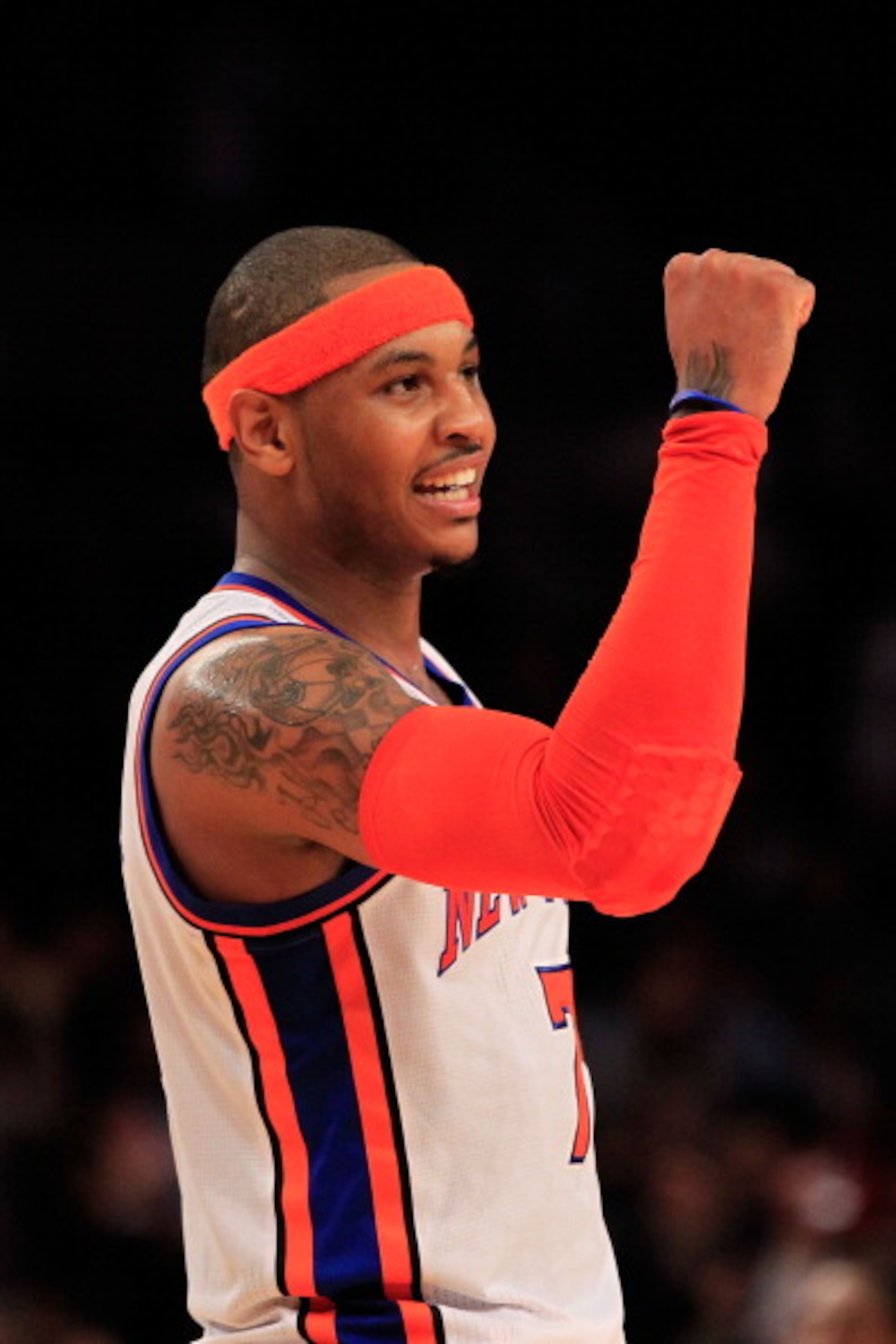 NEW YORK, NY - MARCH 30:  Carmelo Anthony #7 of the New York Knicks celebrates during the game against the New Jersey Nets at Madison Square Garden on March 30, 2011 in New York City. NOTE TO USER: User expressly acknowledges and agrees that, by downloadi