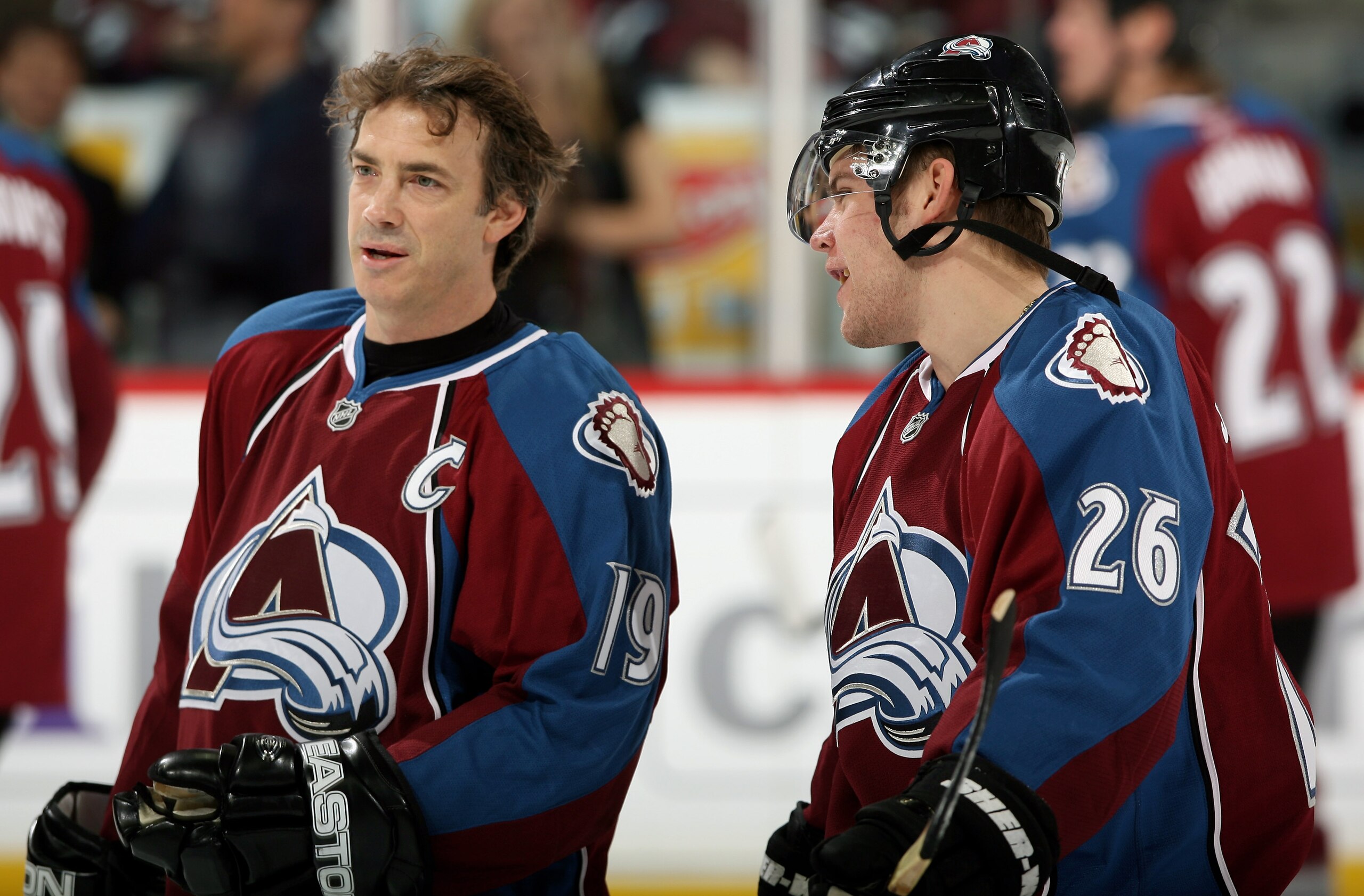 DENVER - NOVEMBER 26:  Joe Sakic #19 and Paul Stastny #26 of the Colorado Avalanche chat during warm ups prior to facing the St. Louis Blues during NHL action at the Pepsi Center November 26, 2008 in Denver, Colorado.  (Photo by Doug Pensinger/Getty Image