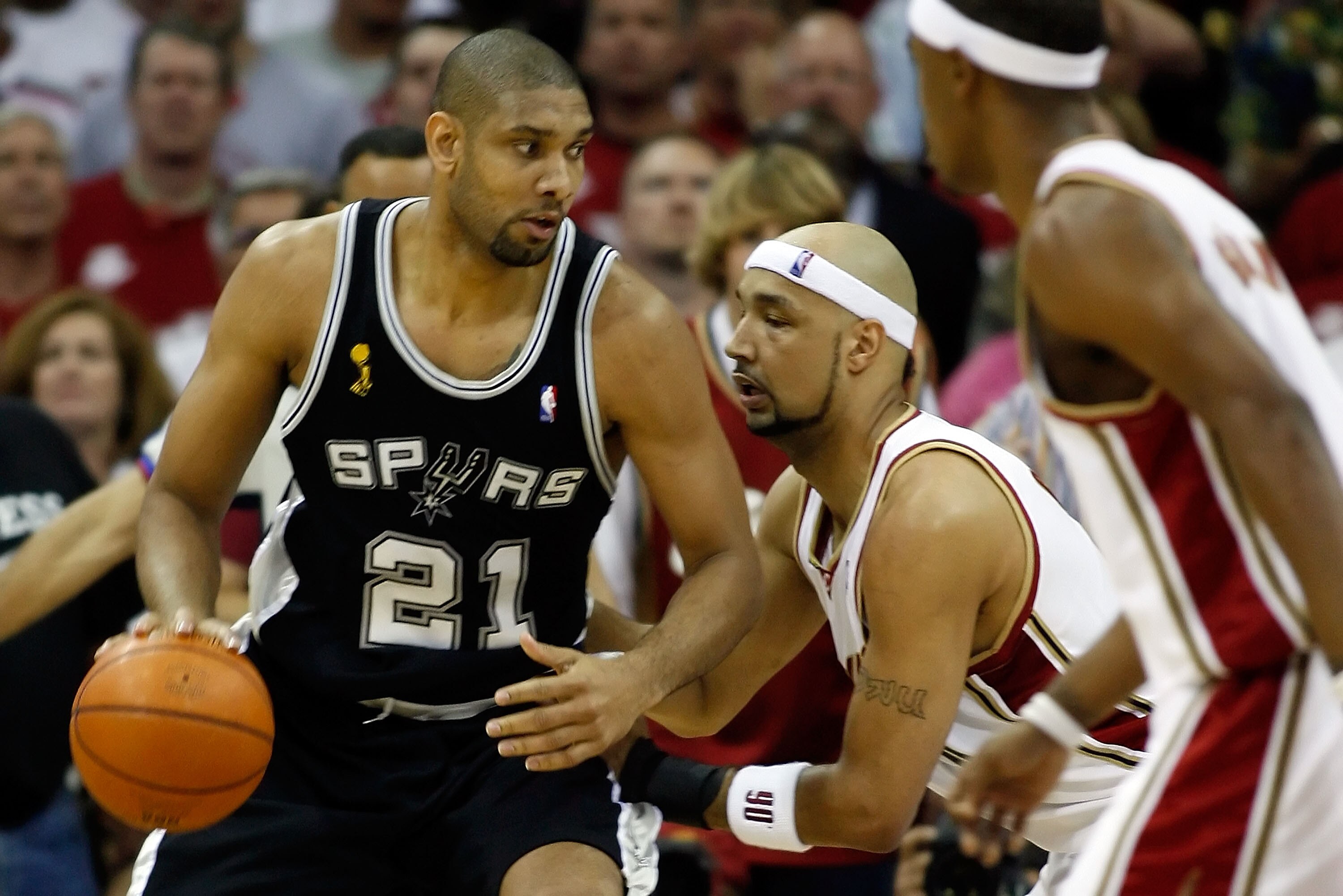 CLEVELAND - JUNE 12: Tim Duncan #21 of the San Antonio Spurs posts up against Drew Gooden #90 of the Cleveland Cavaliers in Game Three of the NBA Finals on June 12, 2007 at the Quicken Loans Arena in Cleveland, Ohio. NOTE TO USER: User expressly acknowled