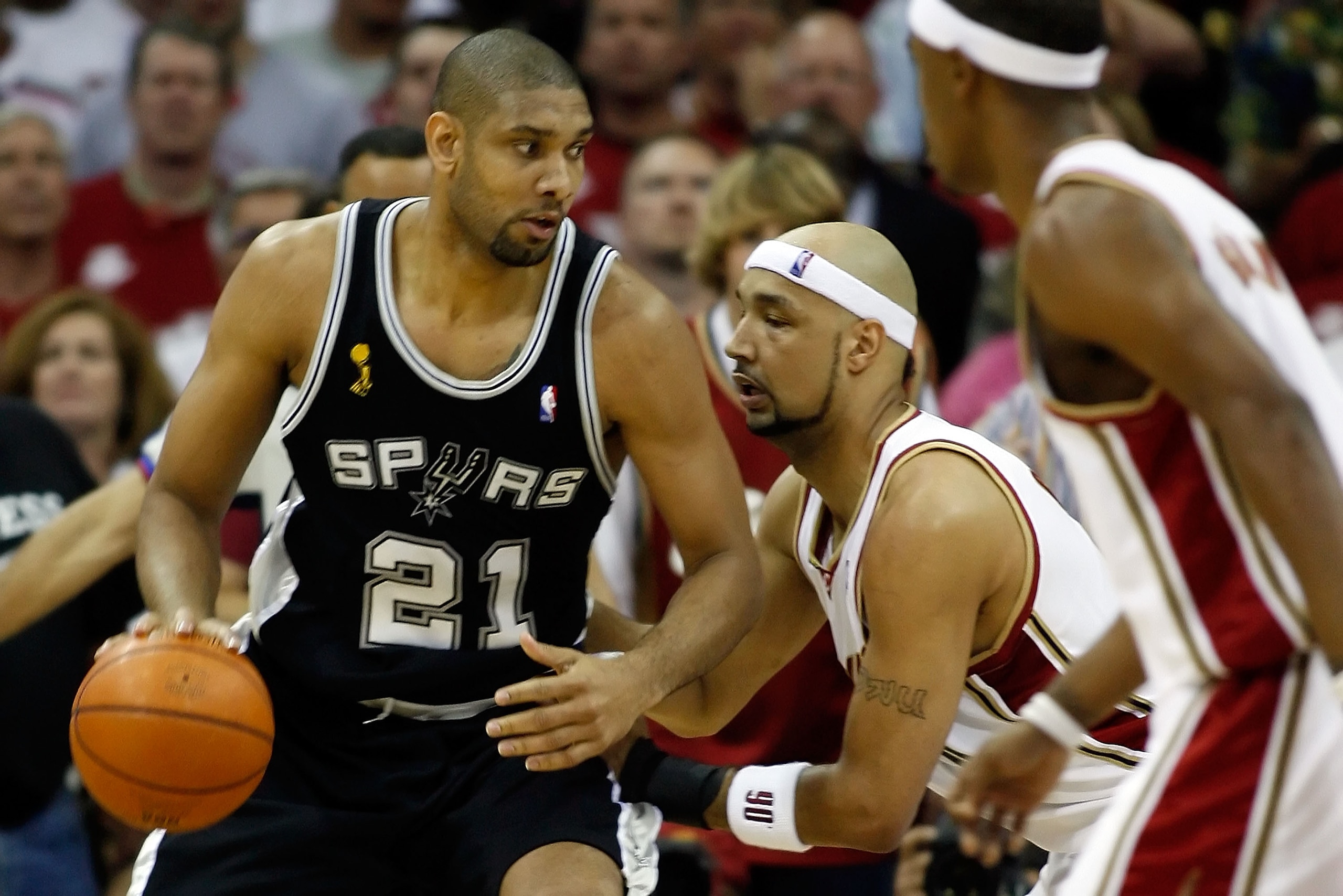 CLEVELAND - JUNE 12: Tim Duncan #21 of the San Antonio Spurs posts up against Drew Gooden #90 of the Cleveland Cavaliers in Game Three of the NBA Finals on June 12, 2007 at the Quicken Loans Arena in Cleveland, Ohio. NOTE TO USER: User expressly acknowled