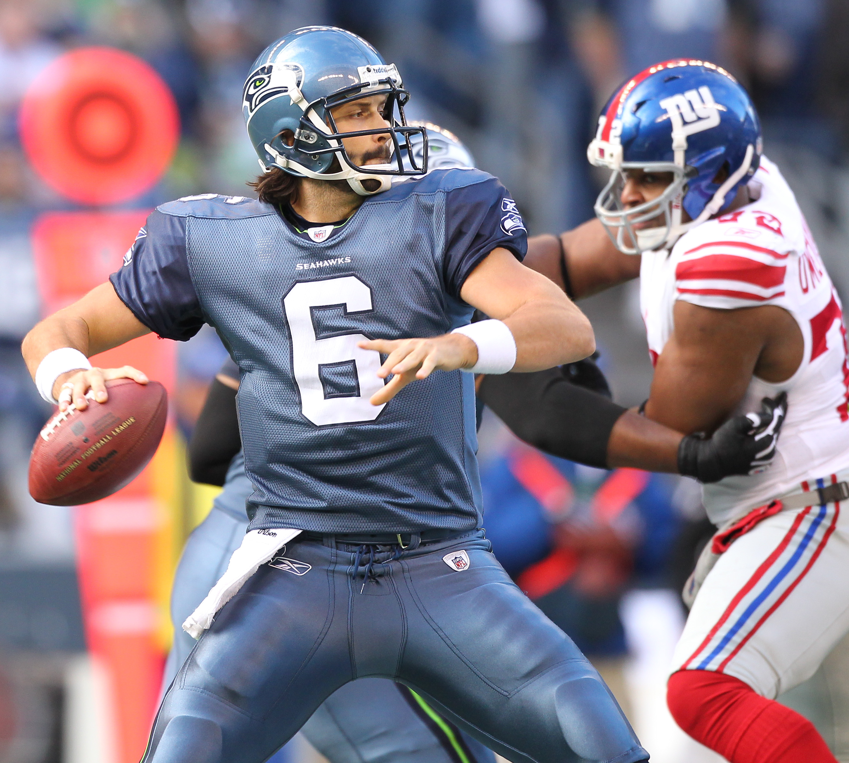 Seattle Seahawks Charlie Whitehurst rolls out of the pocket in the fourth  quarter against the New York Giants in week 5 of the NFL season at MetLife  Stadium in East Rutherford, New Jersey on October 9, 2011. The Seahawks  defeated the Giants 36-25. UPI